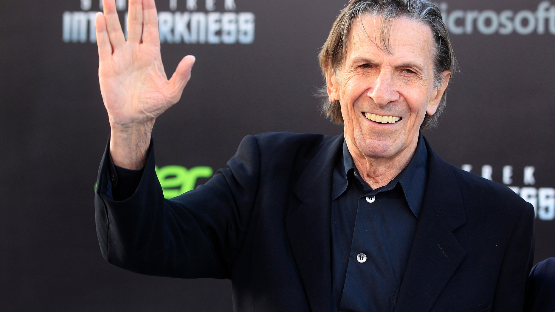 May 14, 2013. Leonard Nimoy, cast member of the new film "Star Trek Into Darkness," poses as he arrives at the film's premiere in Hollywood.