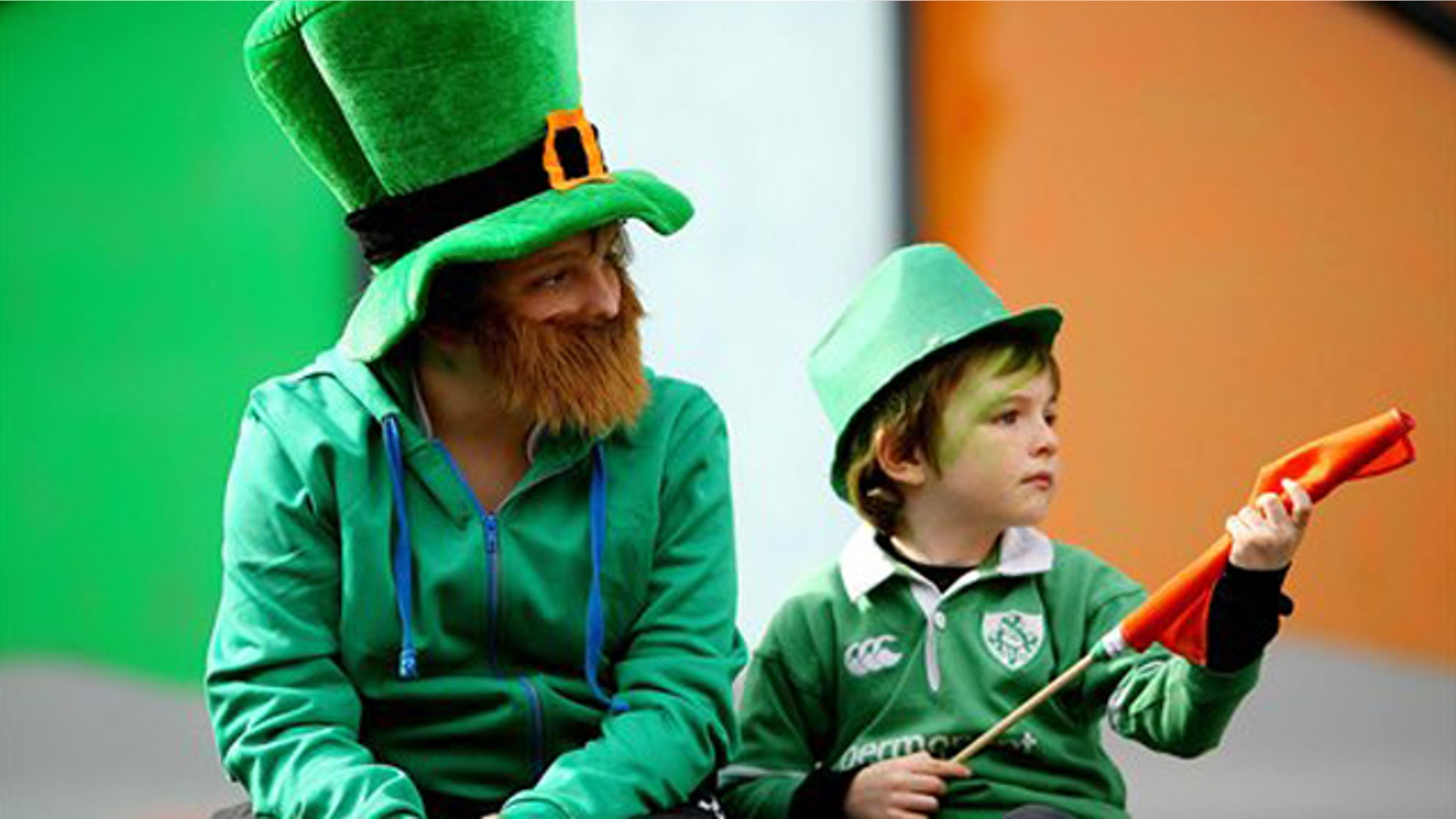 March 17: Children dressed as Leprechauns watch the St Patrick's Day parade in Dublin, Ireland.