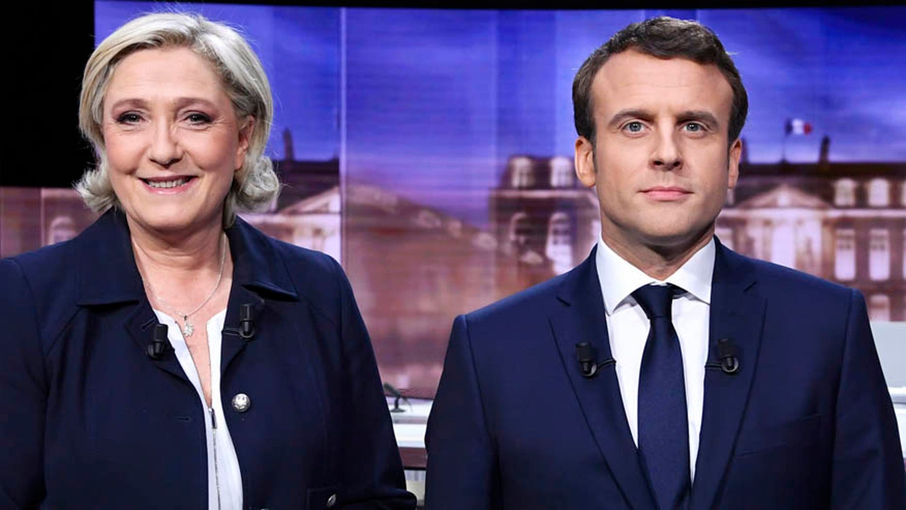 French presidential election candidate for the far-right Front National party, Marine Le Pen, left, and French presidential election candidate for the En Marche! movement, Emmanuel Macron, will face off in the presidential election on Sunday.