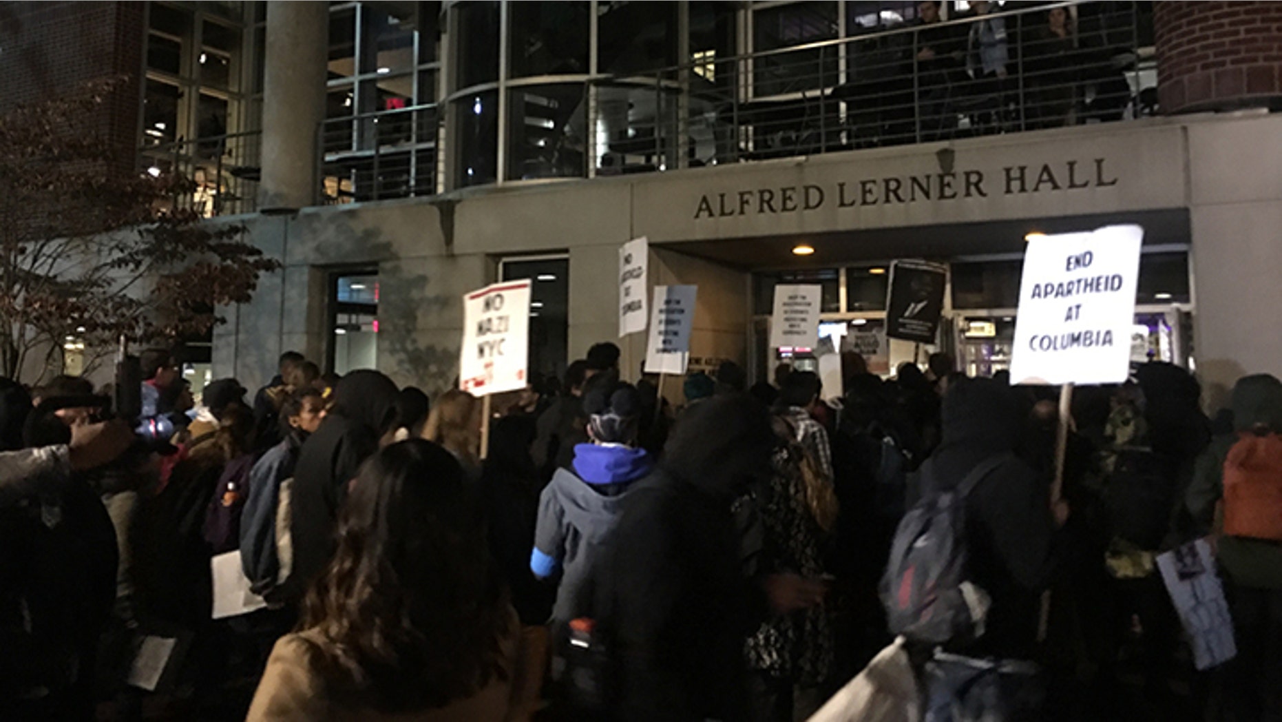 Antifa protesters block the only entrance to a speech on Columbia University's campus by speaker Mike Cernovich.