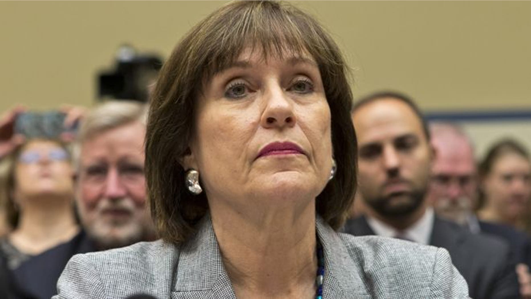 May 22, 2013: Lois Lerner, head of the IRS unit that decides whether to grant tax-exempt status to groups, listens on Capitol Hill in Washington.