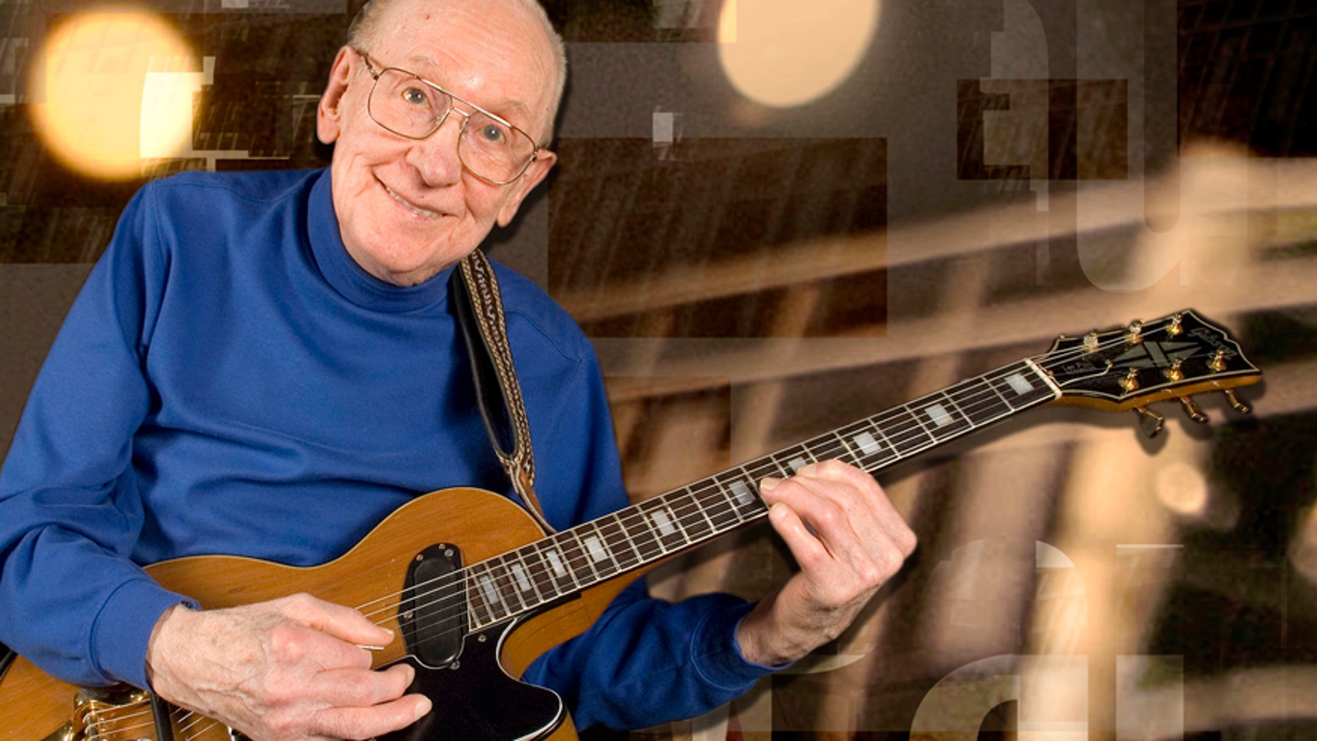 Guitar legend Les Paul smiles at the Iridium Jazz Club Monday, Feb. 26, 2007, in the Manhattan Borough of New York.