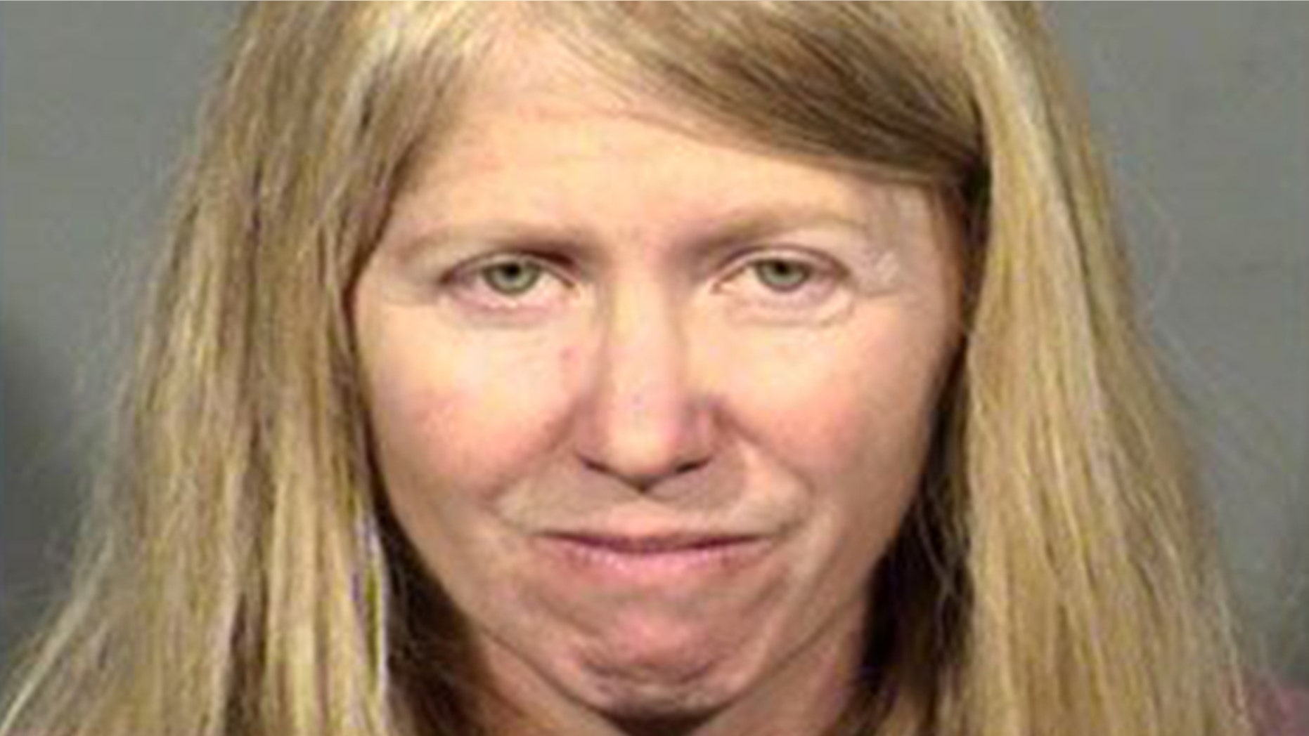 Mugshot for Leslie McGourty charged this month with threatening to shoot up a concert.