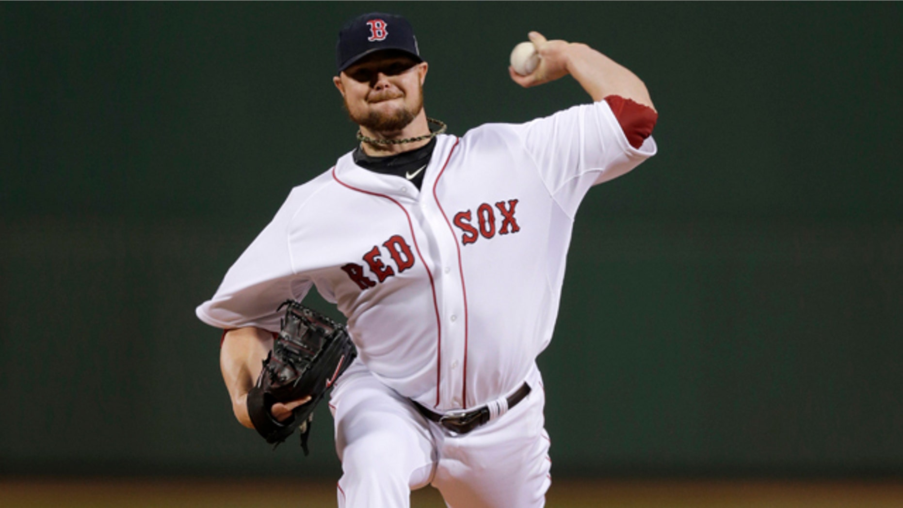 Oct. 23, 2013: Boston Red Sox starting pitcher Jon Lester throws during the first inning of Game 1 of baseball's World Series against the St. Louis Cardinals.