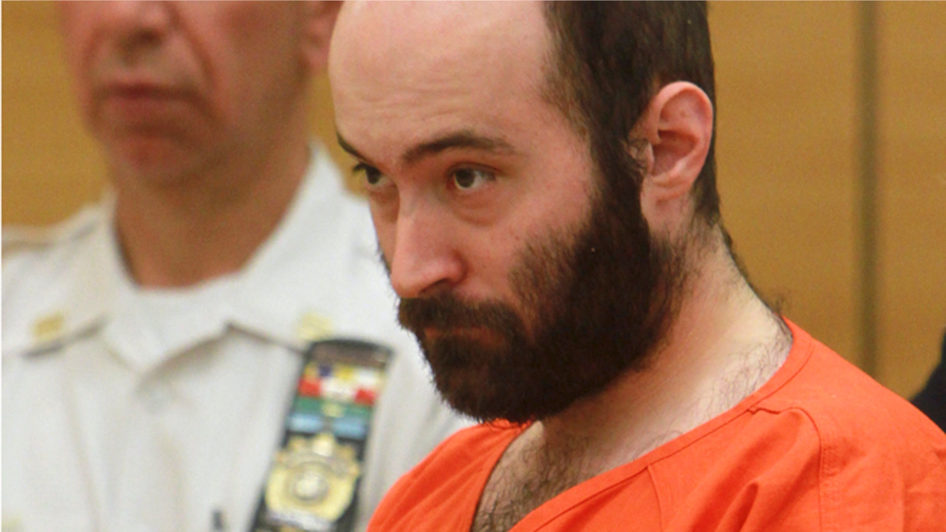 FILE - In this Aug. 4, 2011 file photo, Levi Aron, accused of abducting and dismembering Brooklyn boy Leiby Kletzky, is arraigned in Brooklyn criminal court in New York.
