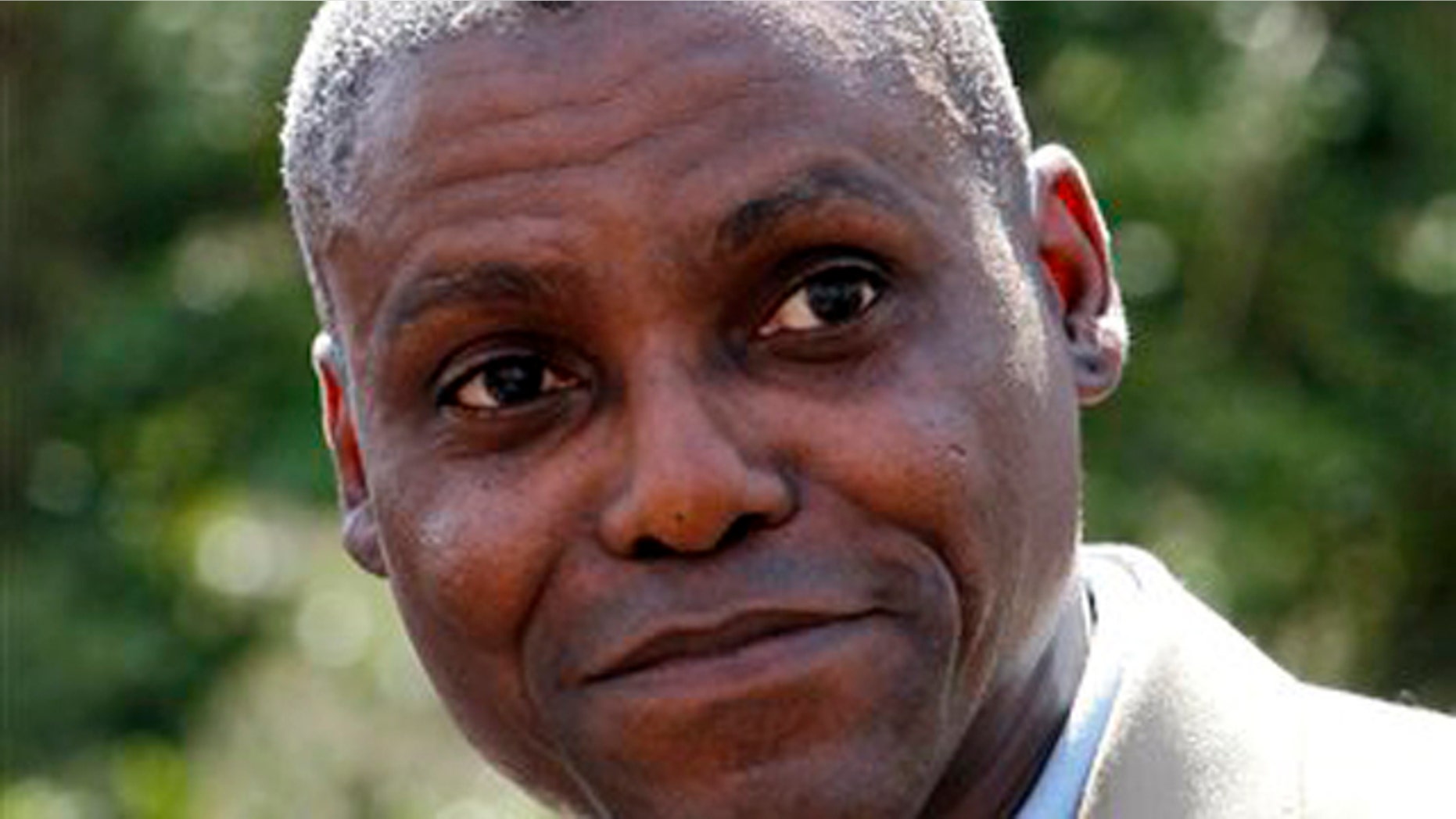 In this April 11, 2011 file photograph, former Olympic gold medalist Carl Lewis announces in Mount Holly, N.J., his candidacy for the New Jersey state Senate seat to represent his hometown of Willlingboro.