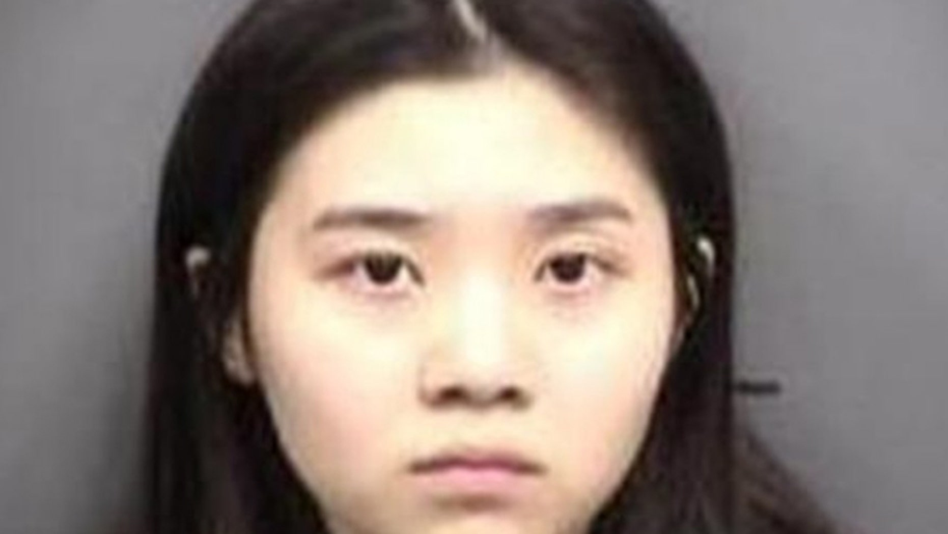 Leyi Huang has agreed to be deported after admitting to cheating on a U.S. college entrance exam.
