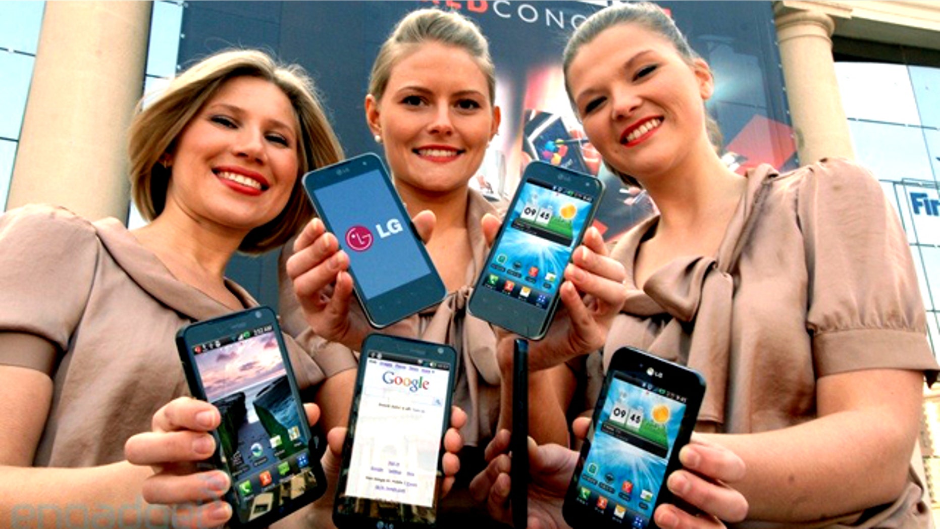 Models show off LG's new 3D phone at the Mobile World Congress 2011 show in Barcelona.