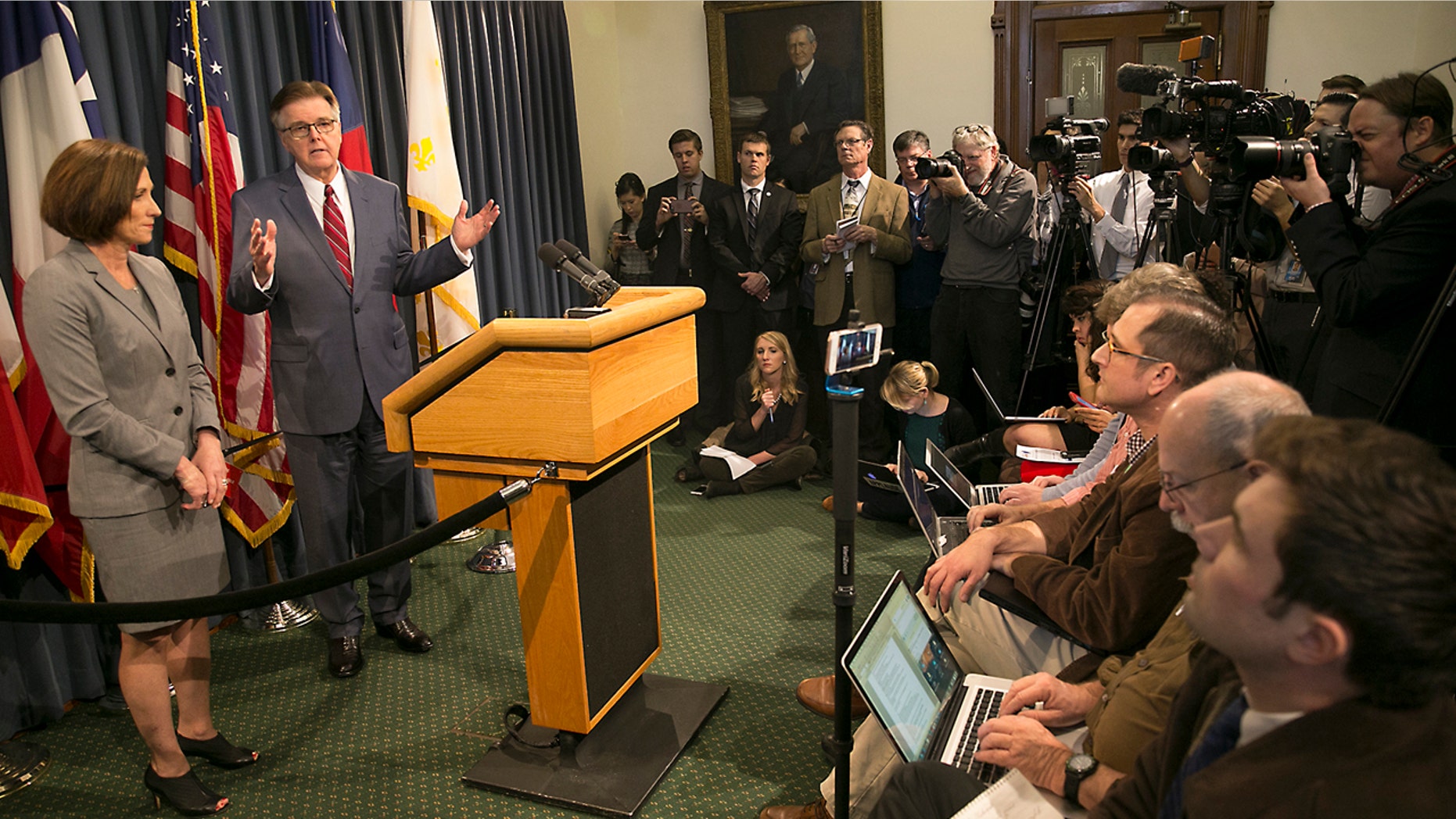 Texas Lt. Gov. Dan Patrick and Senator Lois Kolkhorst introduced Senate Bill 6 known as the Texas Privacy Act, which provides solutions to the federal mandate of transgender bathrooms, showers and dressing rooms in all Texas schools. The two legislators answer questions from a press availability Thursday, Jan. 5, 2017, in the Senate Conference room at the State Capitol in Austin, Texas. (Ralph Barrera/Austin American-Statesman via AP)