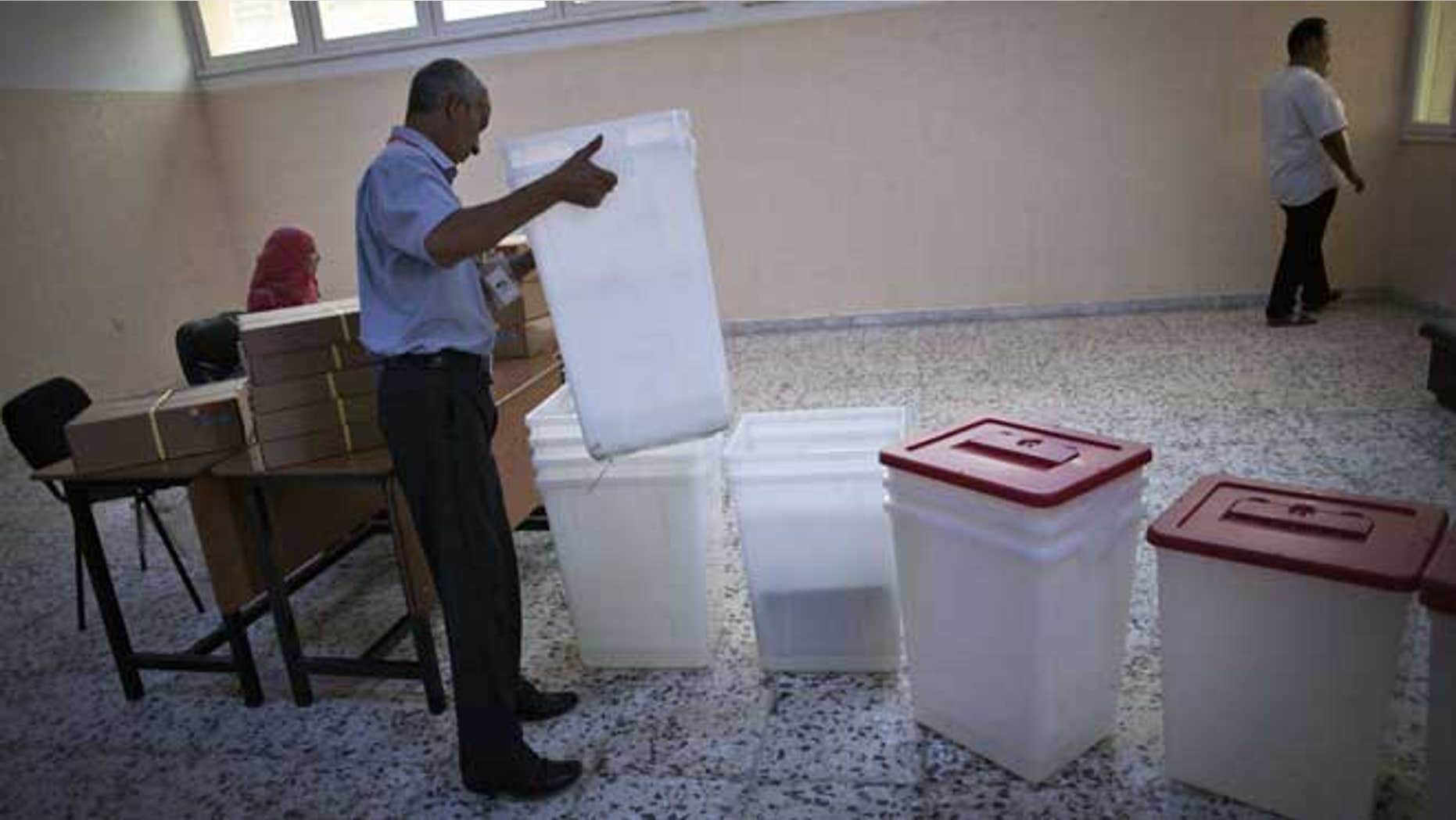 July 6, 2012: A Libyan election official works at a polling station in Tripoli, Libya. The Libyan National Assembly elections - the first free election since 1969-will take place on July 7, 2012.