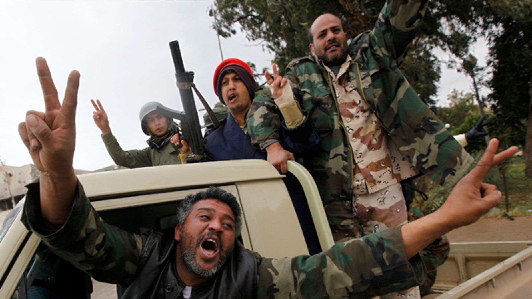Feb. 27, 2011: Anti-Lybian leader gunmen celebrate the freedom of the Libyan city of Benghazi, Libya. U.S. President Barack Obama has called on Libyan dictator Muammar Qaddafi to leave power immediately.