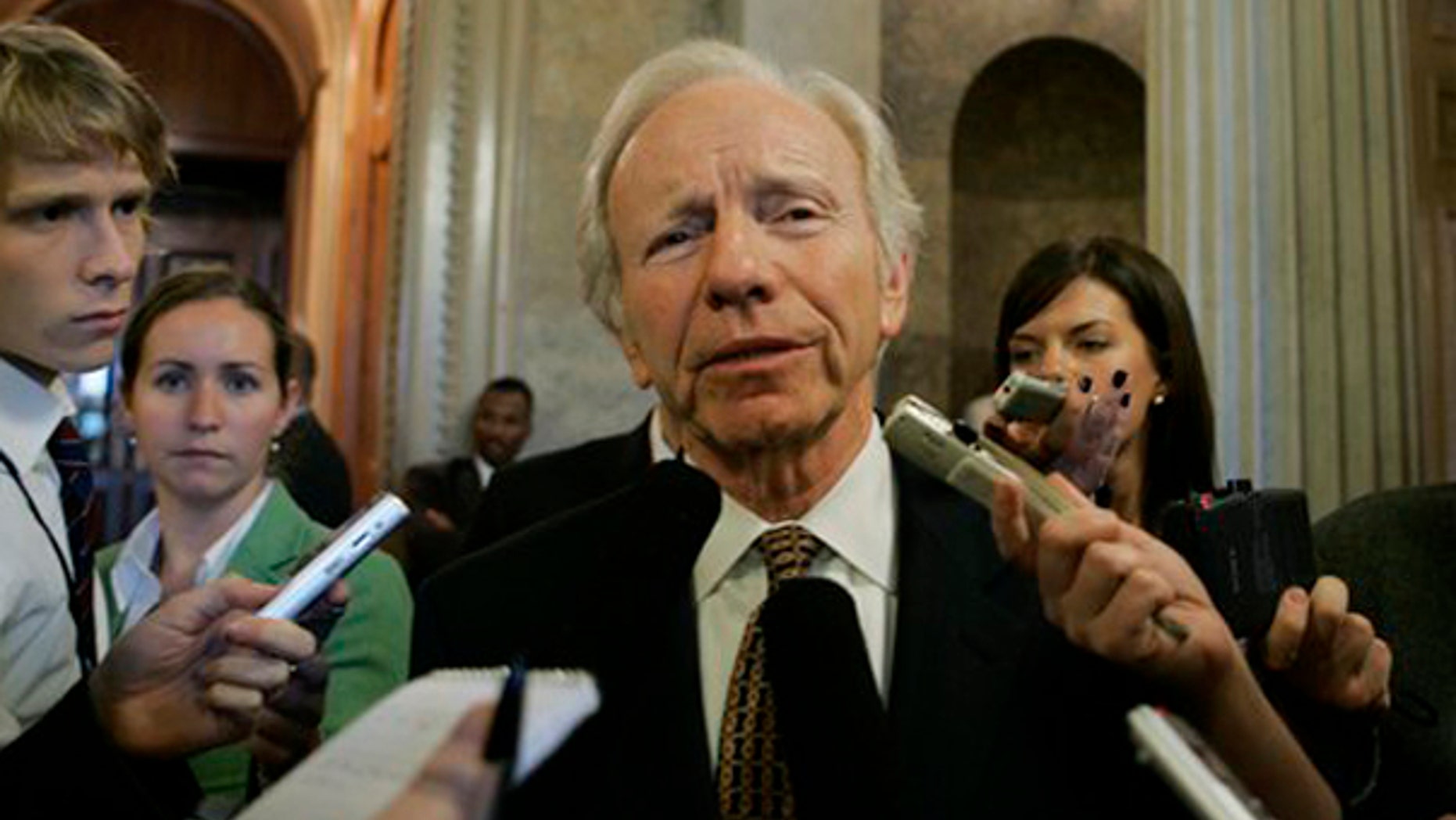 Sen. Joseph Lieberman speaks to reporters on Capitol Hill in Washington Oct. 27. (AP Photo)