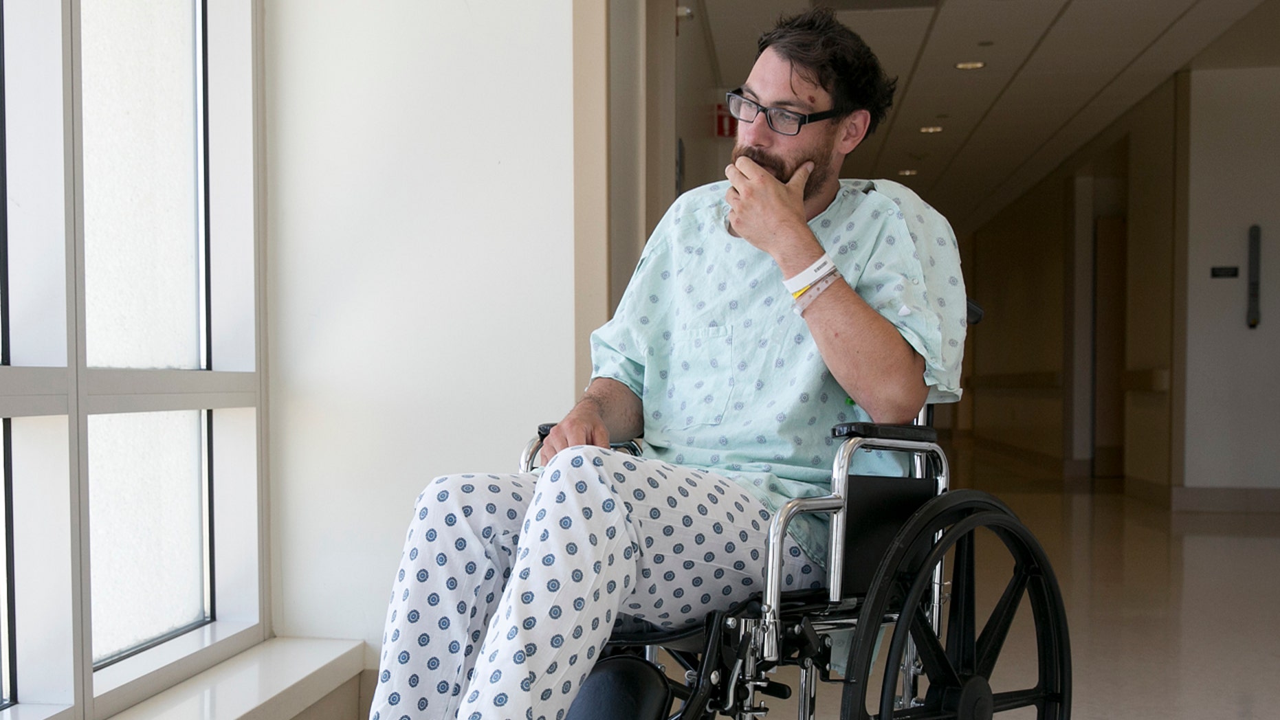 Mathias Steinhuber, of Innsbruck, Austria, who survived being struck by a lighting bolt, pauses while discussing the near-fatal event, Thursday, Aug. 24, 2017, in Sacramento, Calif.
