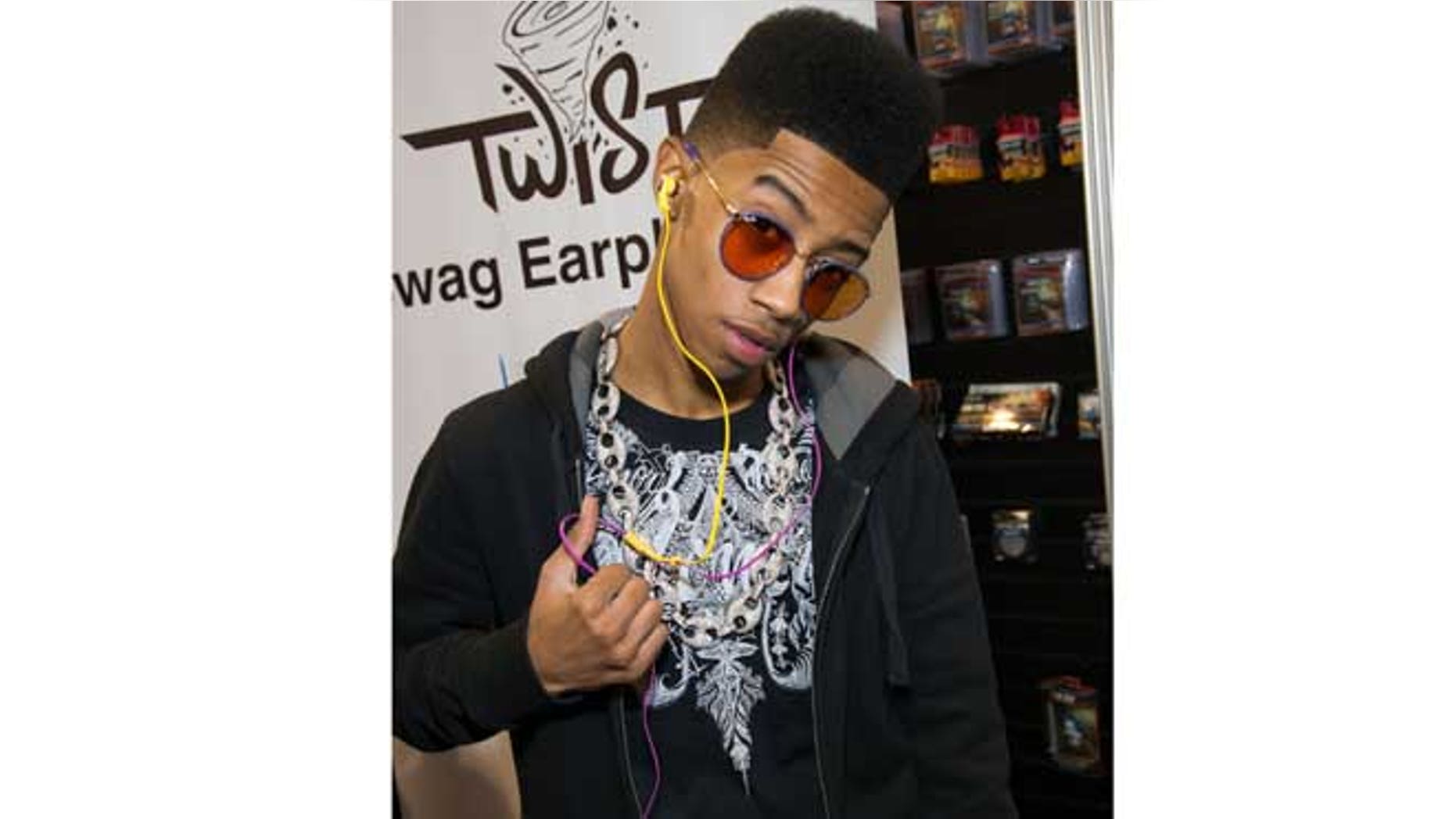 Jan. 10, 2013: In this publicity image originally released by Nikura USA, Hip hop artist, Lil Twist, born Christopher Moore, debuts his new headphone collection at International CES 2013 in Las Vegas, Nev.