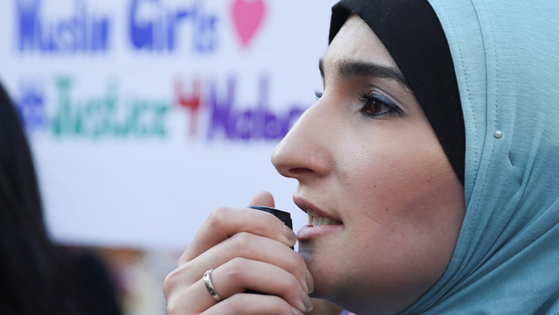 Activist Linda Sarsour addresses attendees at a vigil for Nabra Hassanen, a 17 year old teenage Muslim girl killed by a bat-wielding motorist near a Virginia mosque, Manhattan, New York, U.S., June 20, 2017. Picture taken June 20, 2017. REUTERS/Amr Alfiky - RTS188WI