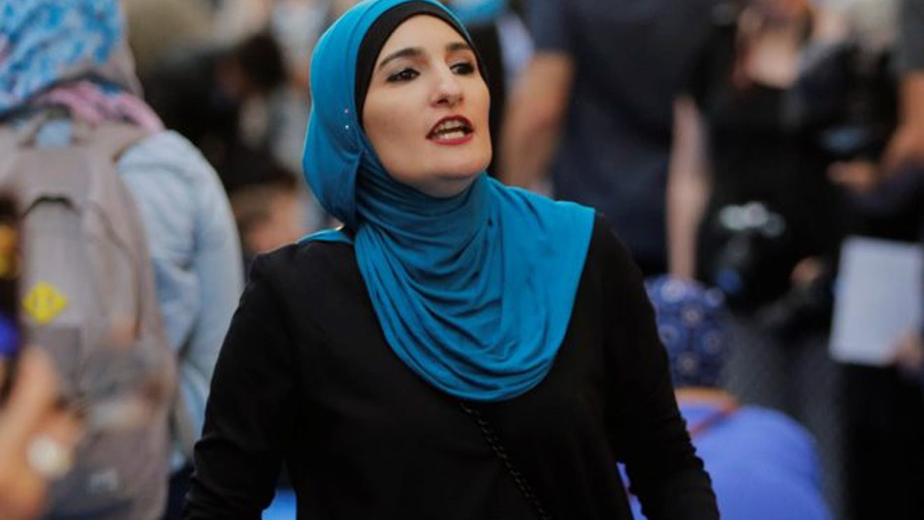 Activist Linda Sarsour prepares for the beginning of a demonstration and Iftar celebration during Ramadan outside of Trump Tower in New York, U.S., June 1, 2017. REUTERS/Lucas Jackson - RTX38MHA