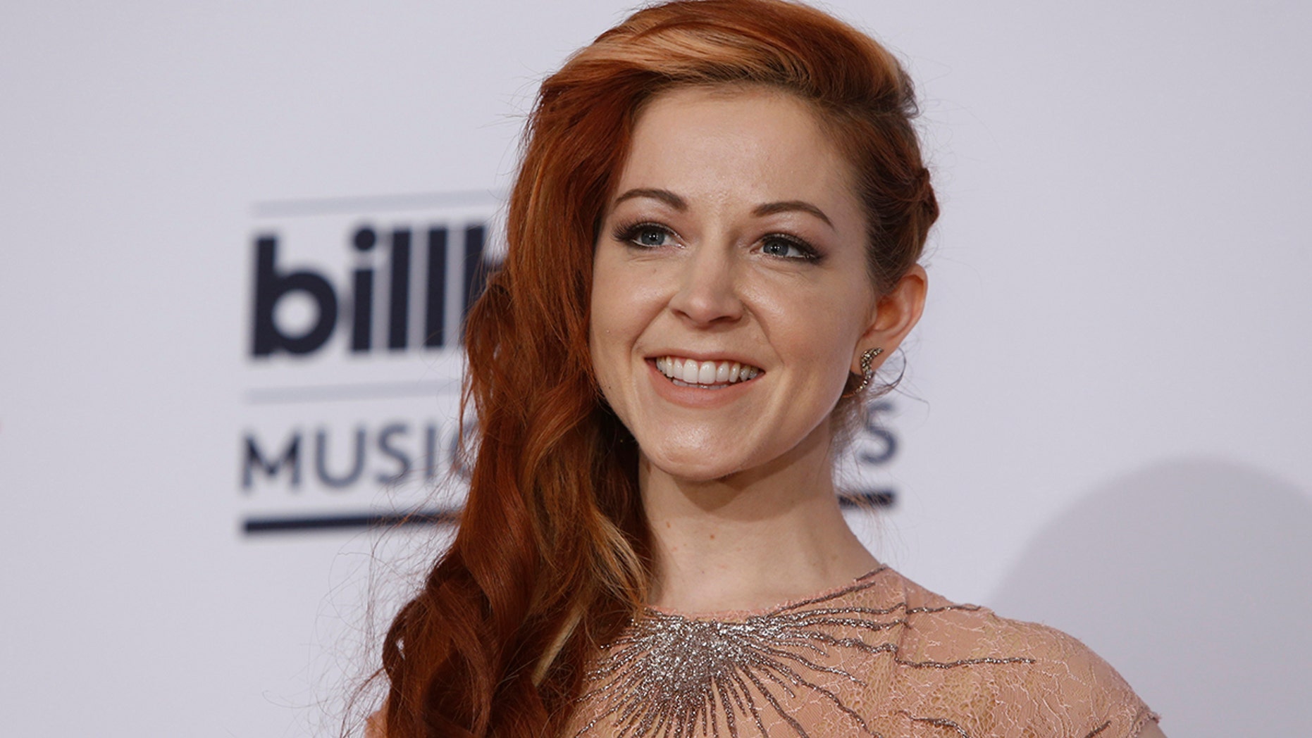 Violinist Lindsey Stirling poses backstage at the 2016 Billboard Awards in Las Vegas, Nevada, U.S., May 22, 2016. REUTERS/Steve Marcus - HT1EC5N088TCE