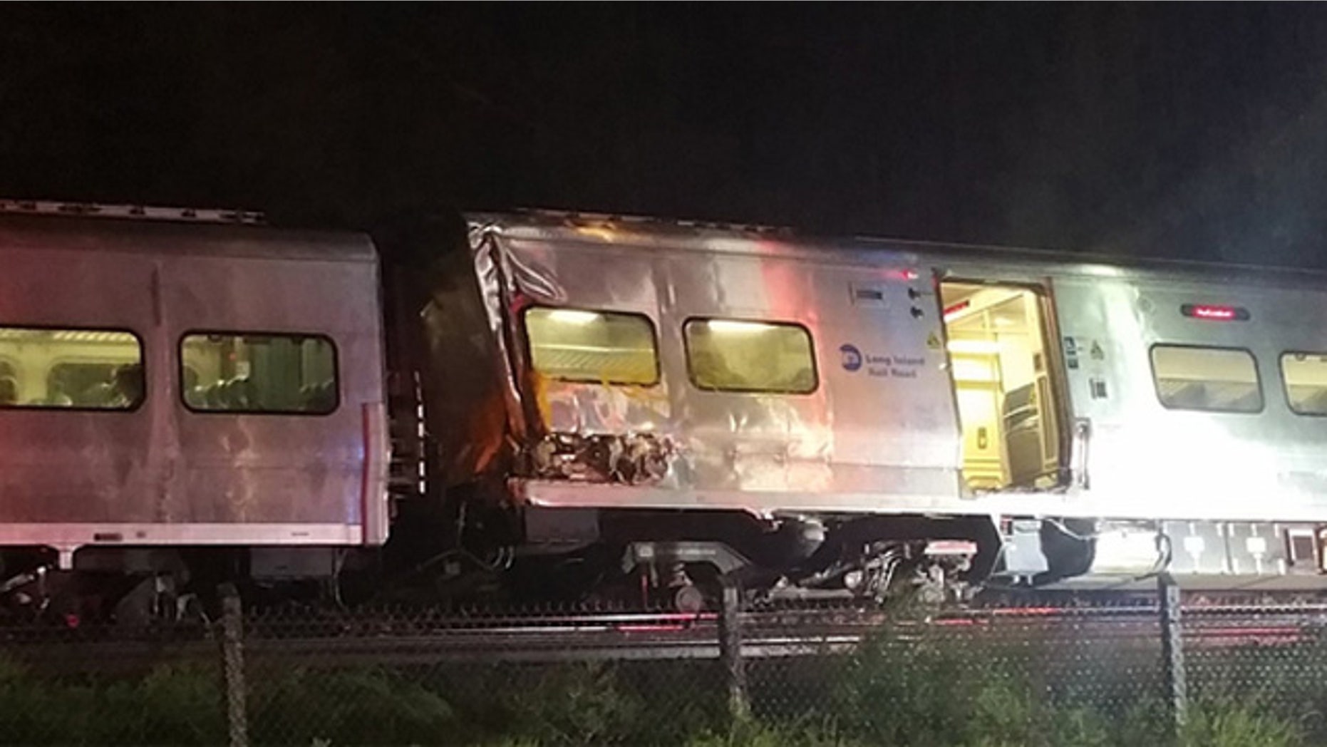 Oct. 8, 2016: A Long Island Railroad commuter train sits on the tracks after derailing in Nassau County, N.Y.