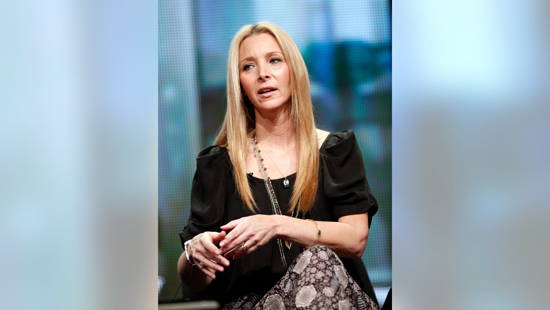 August 4, 2011. Lisa Kudrow answers a question at the Showtime session for "Web Therapy" during the 2011 Summer Television Critics Association Cable Press Tour in Beverly Hills, California.