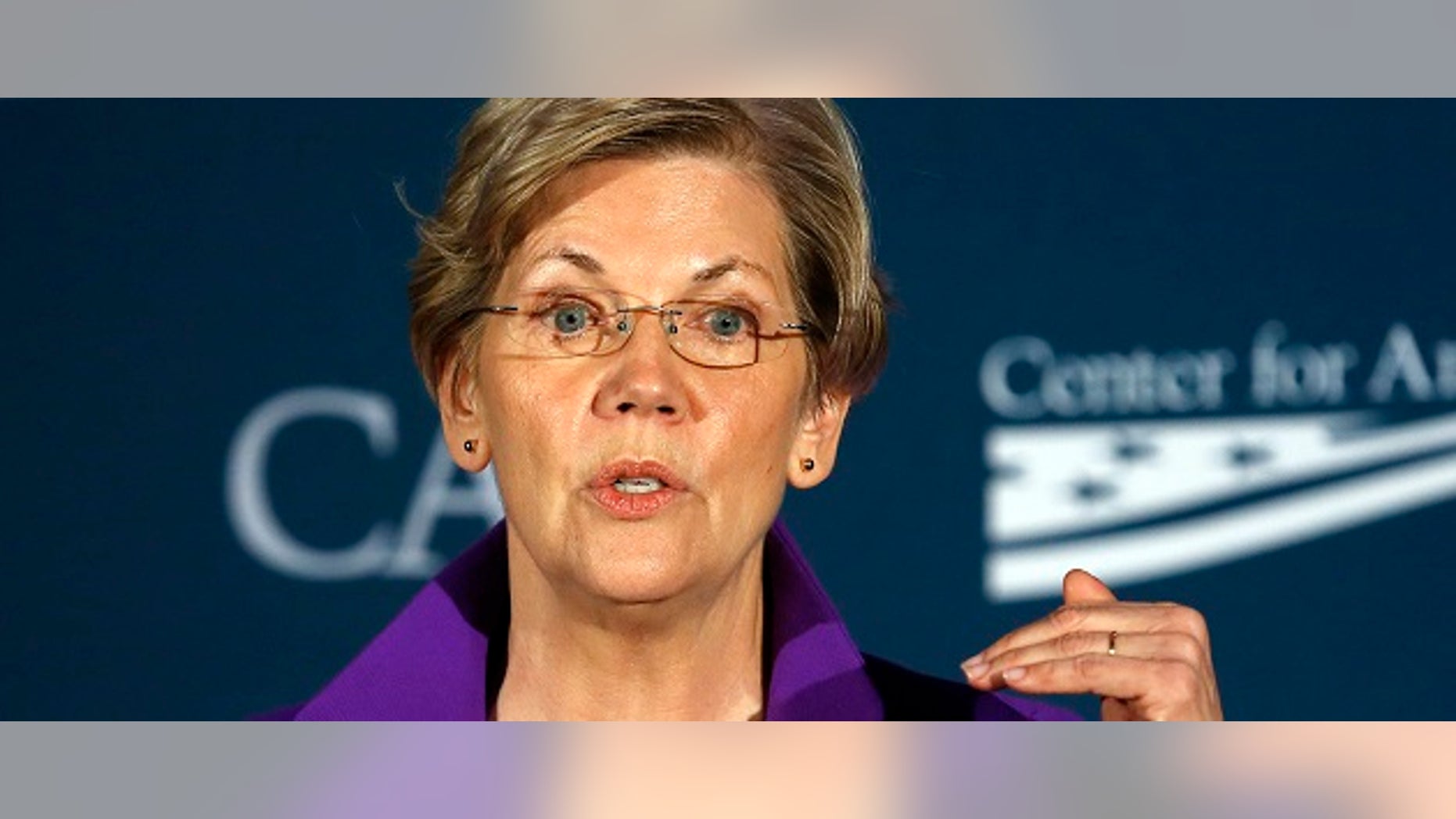 Sen. Elizabeth Warren (D-MA) speaks at the Center for American Progress' 2014 Making Progress Policy Conference in Washington Nov. 19, 2014. (REUTERS/Gary Cameron)