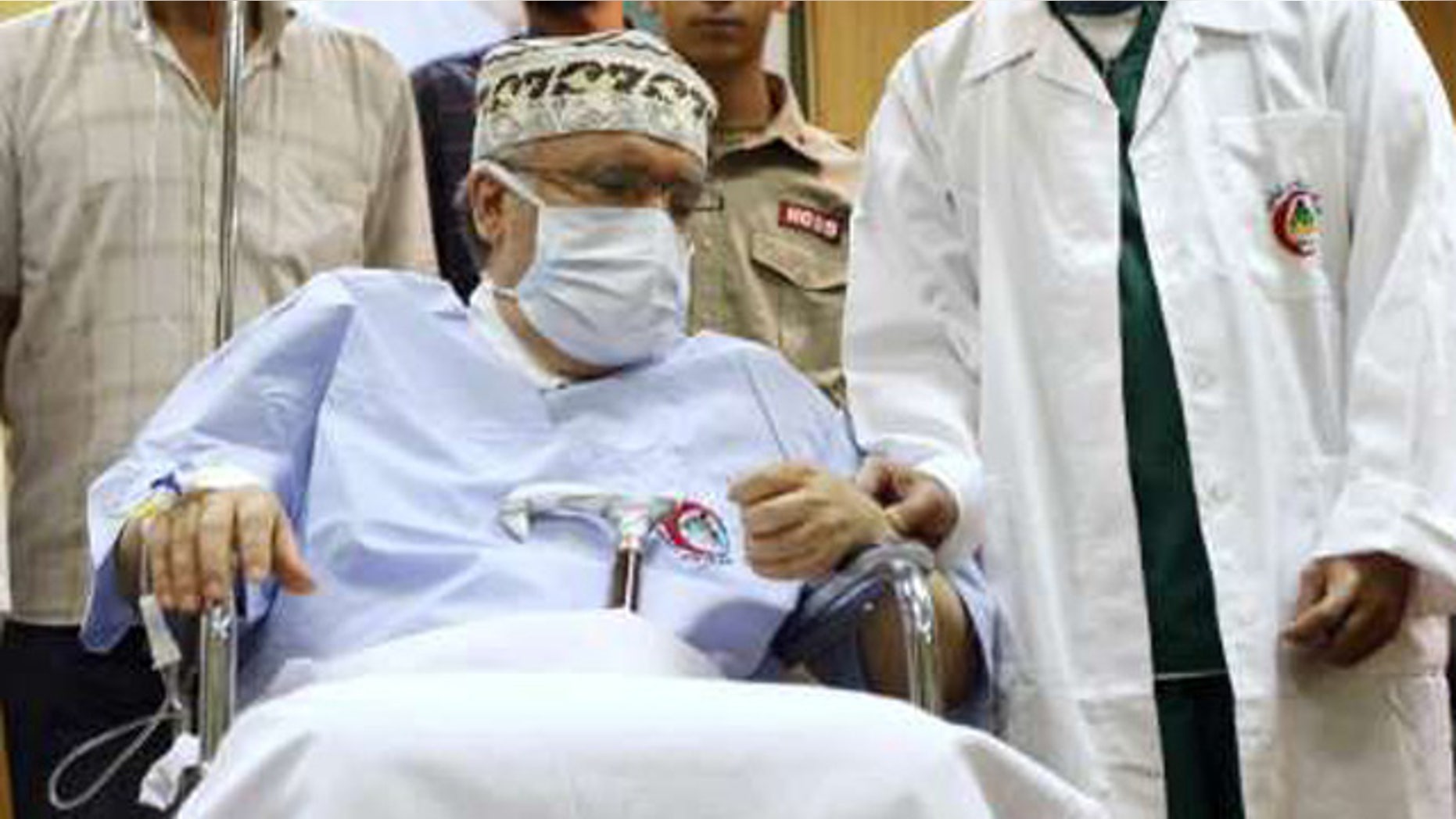 FILE 2009: Abdel Basset al-Megrahi is seen in his room at a hospital in Tripoli.