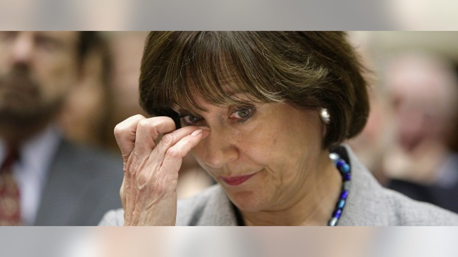 U.S. Director of Exempt Organizations for the Internal Revenue Service (IRS) Lois Lerner waits to testify at a House Oversight and Government Reform Committee hearing on alleged targeting of political groups seeking tax-exempt status from by the IRS, on Capitol Hill in Washington, May 22, 2013. Lerner, the IRS official who this month revealed the tax agency's targeting of conservative groups asserted her constitutional right not to answer questions before a congressional committee on Wednesday. REUTERS/Jonathan Ernst (UNITED STATES - Tags: POLITICS BUSINESS) - RTXZWM0