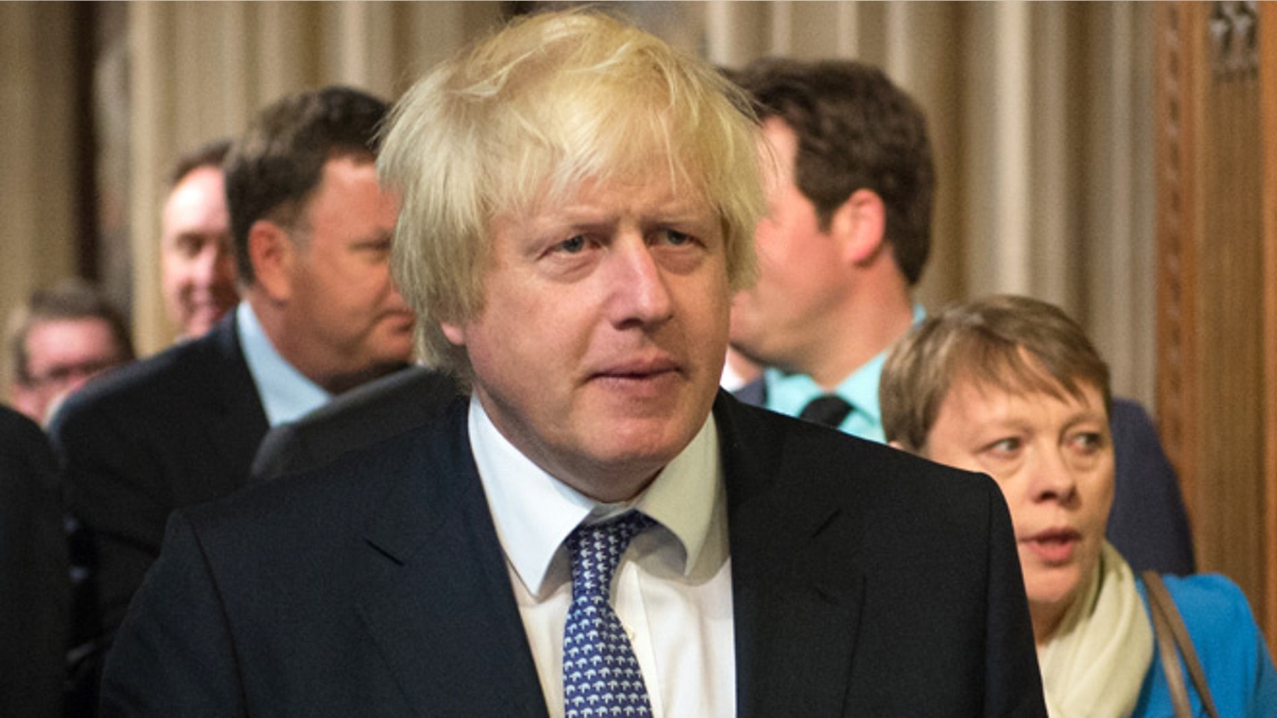 May 27, 2015: The Mayor of London and Conservative Party MP Boris Johnson arrives in the House of Commons chamber following the State Opening of Parliament at the Palace of Westminster in London, Britain.
