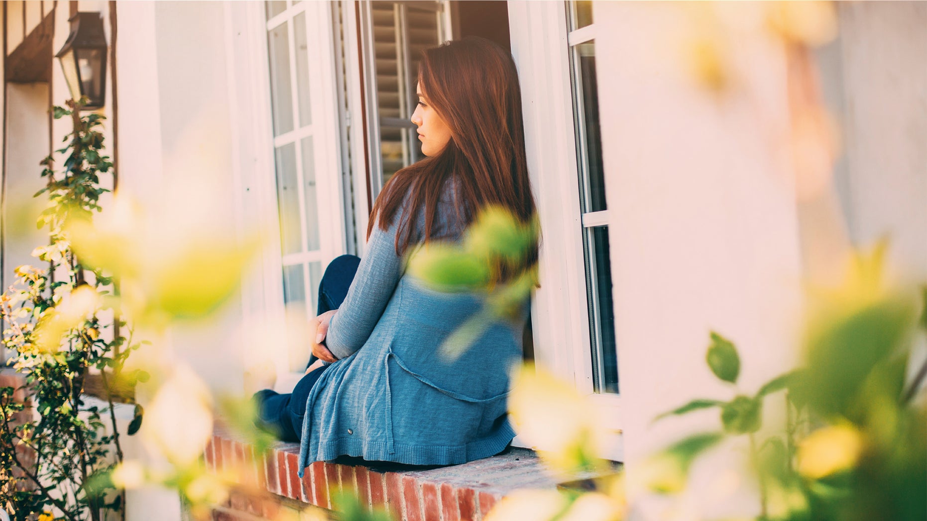 Lonely woman in house