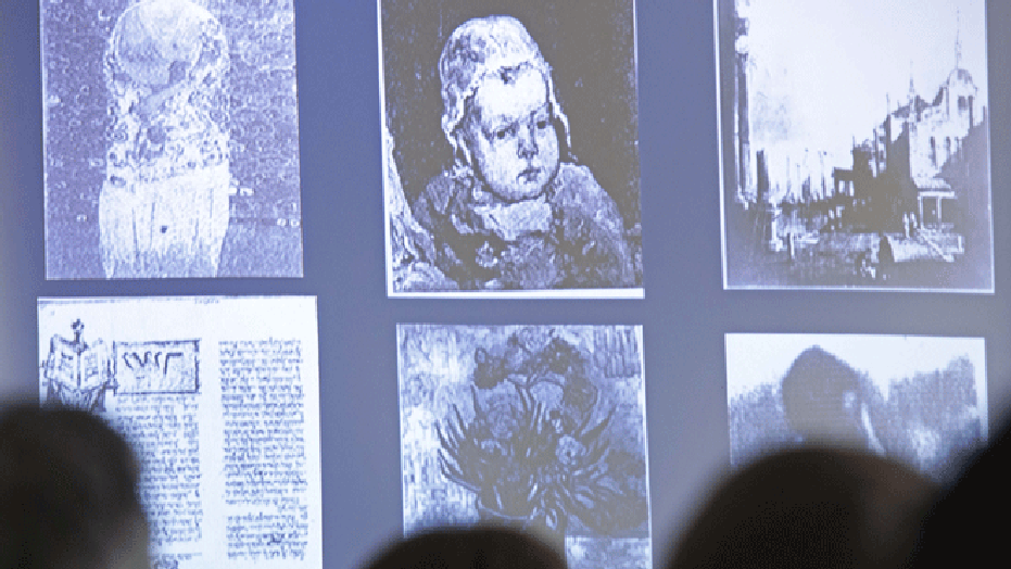 June 14, 2012: People look at a display of looted art on a video screen as they attend the Provenance Research Training Program to the Nazi-looted art, in Magdeburg, central Germany.