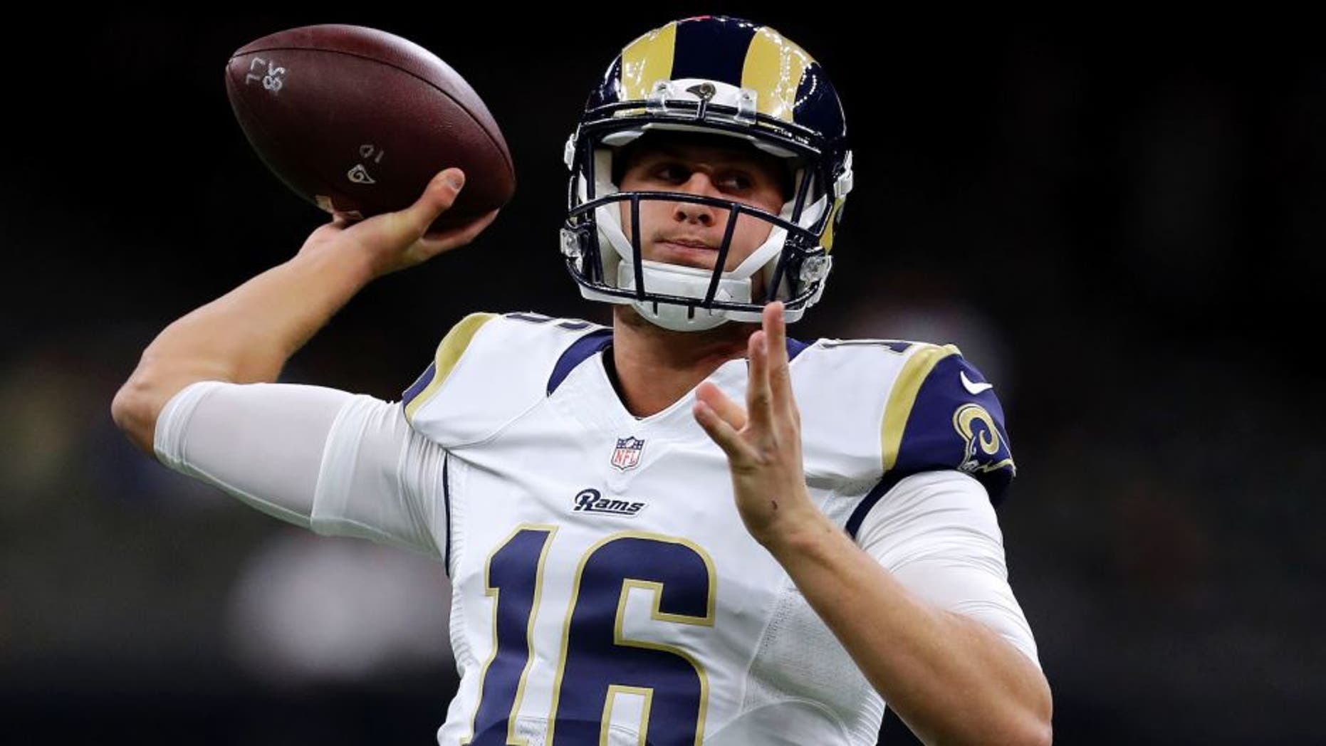 NEW ORLEANS, LA - NOVEMBER 27: Jared Goff #16 of the Los Angeles Rams warms up before a game against the New Orleans Saints at the Mercedes-Benz Superdome on November 27, 2016 in New Orleans, Louisiana. (Photo by Sean Gardner/Getty Images)