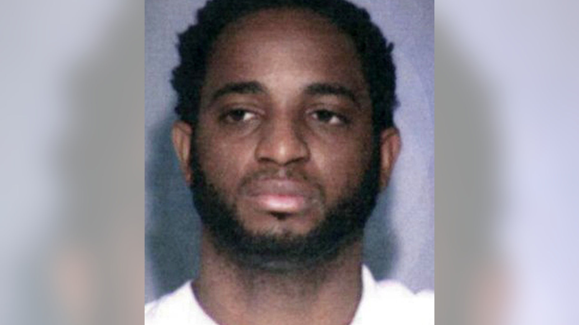 This undated photo provided by the FBI shows fugitive Marlon Jones who is wanted for multiple counts of murder in Los Angeles.