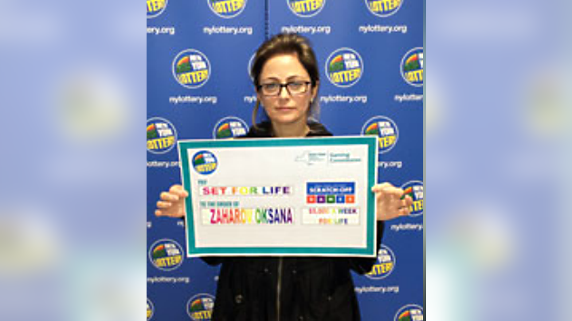 Oksana Zaharov won $5 million in a scratch-off ticket she did not mean to purchase.