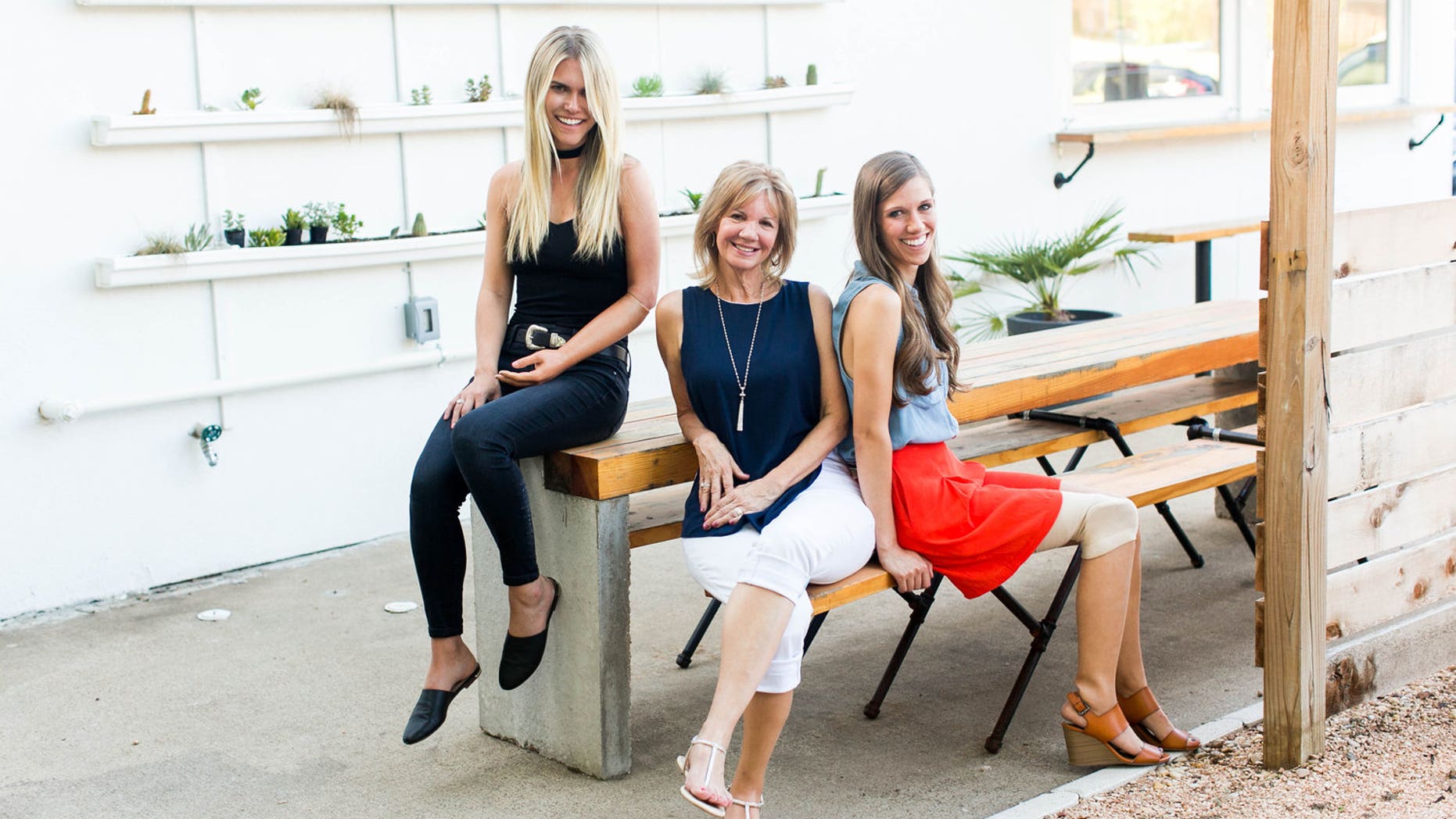 LSK Foundation co-founders Lauren Scruggs Kennedy and Lisa Curlee, and director Ashley Igo, pose for a photo.