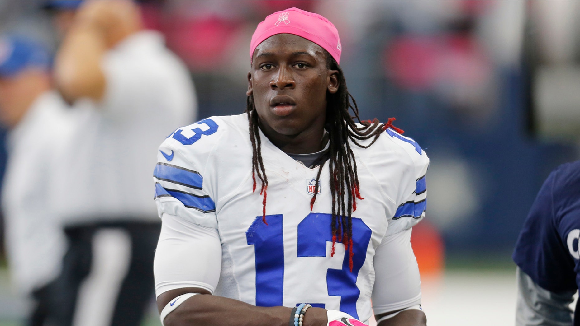 Dallas Cowboys wide receiver Lucky Whitehead prepares before an NFL game against the New England Patriots.