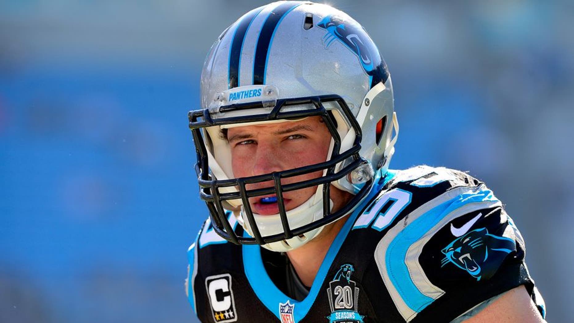 CHARLOTTE, NC - DECEMBER 14: Luke Kuechly #59 of the Carolina Panthers warms up before their game against the Tampa Bay Buccaneers at Bank of America Stadium on December 14, 2014 in Charlotte, North Carolina. (Photo by Grant Halverson/Getty Images)