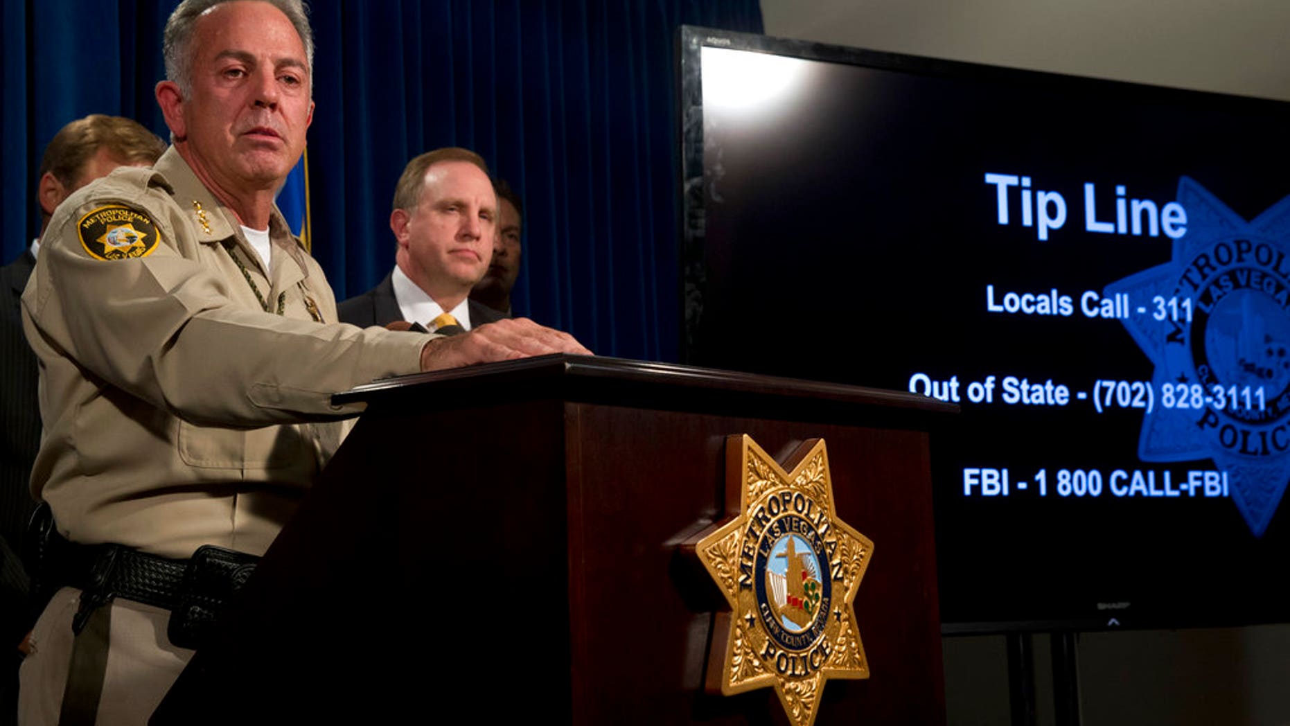Clark County Sheriff Joe Lombardo holds a media briefing at Metro Police headquarters in Las Vegas Wednesday, Oct. 4, 2017. Investigators trying to figure out the Las Vegas gunman, Stephen Paddock's state of mind have so far been stymied by the secret life he appeared to lead before the attack on a country music concert on the Las Vegas Strip Sunday. (Steve Marcus/Las Vegas Sun via AP)