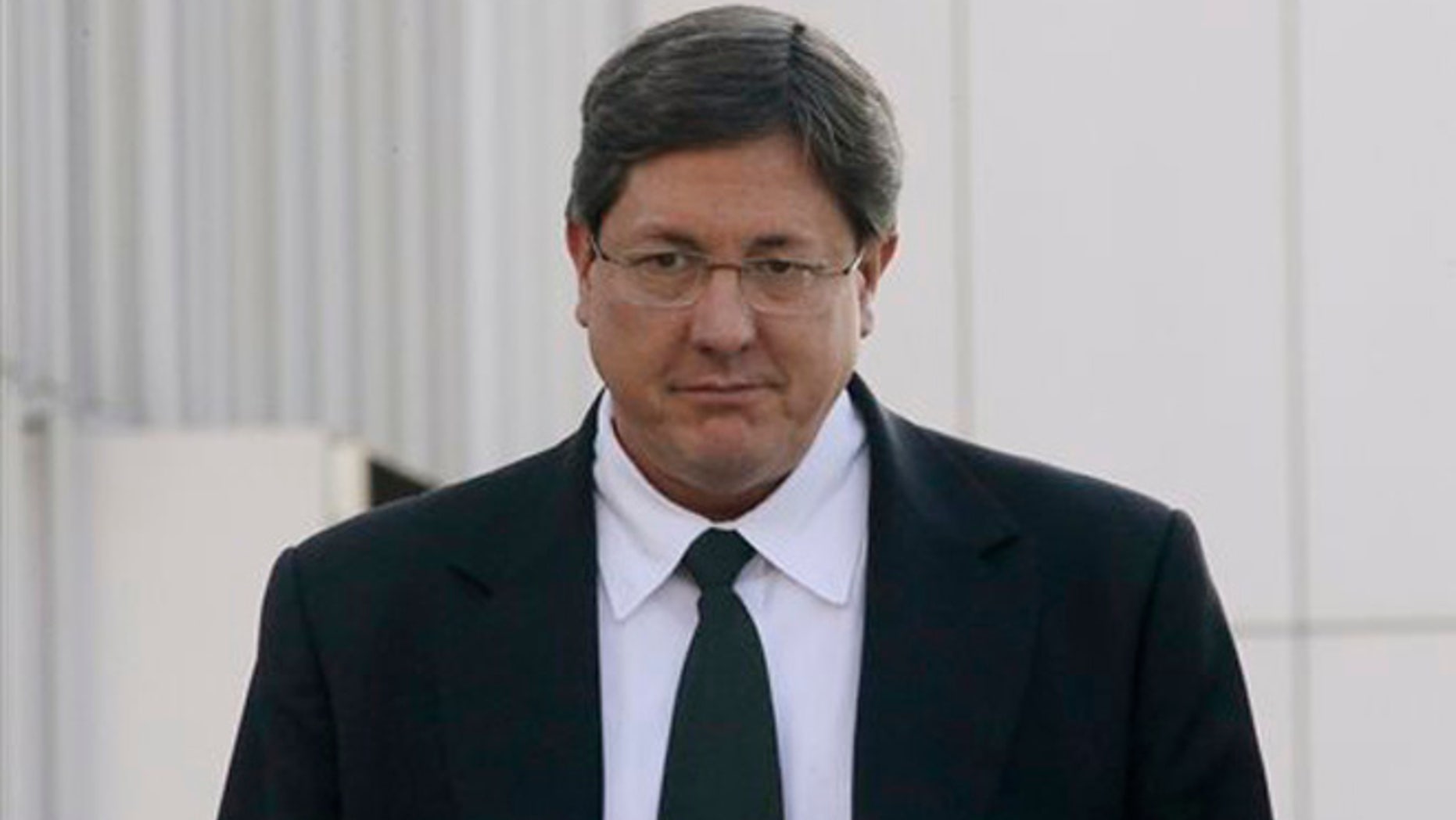 FILE - In this Jan. 21, 2015 file photo, Lyle Jeffs leaves the federal courthouse in Salt Lake City. On Tuesday, Feb. 23, 2016, several top leaders from Warren Jeffs' polygamous sect, including Lyle Jeffs, were arrested on federal accusations of food stamp fraud and money laundering marking one of the biggest blows to the group in years. (AP Photo/Rick Bowmer, File)