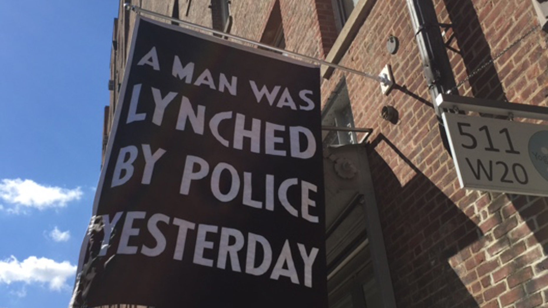 The art gallery's banner is stirring controversy, especially in the wake of last week's murder of five Dallas police officers. (FoxNews.com)