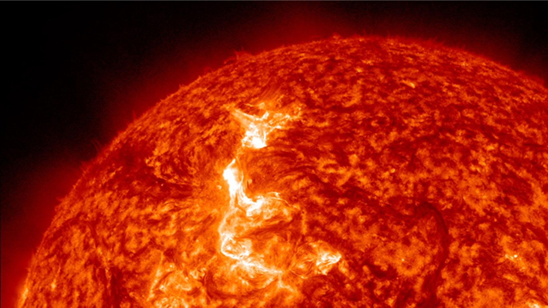 Jan. 19, 2012: A powerful M2-class solar flare erupts from the sun in this image from NASA's Solar Dynamics Observatory.