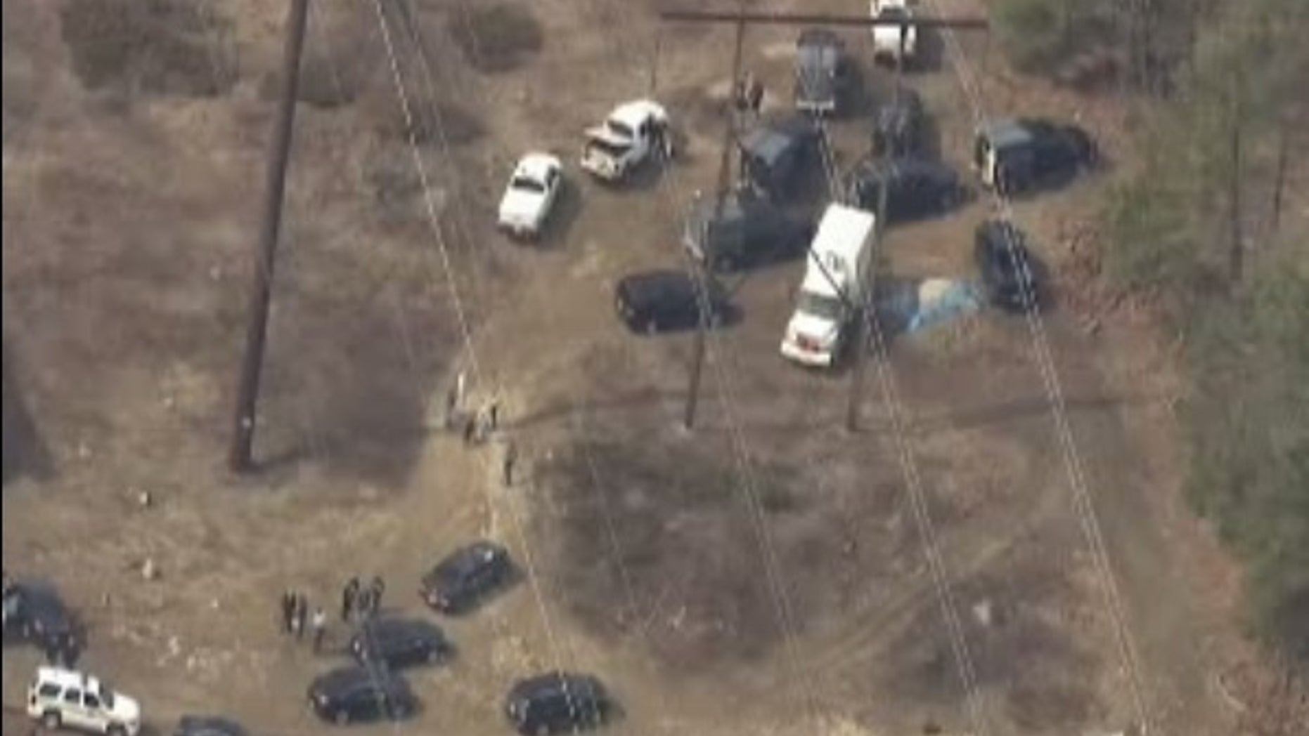 Investigators at the scene where the devices were found.