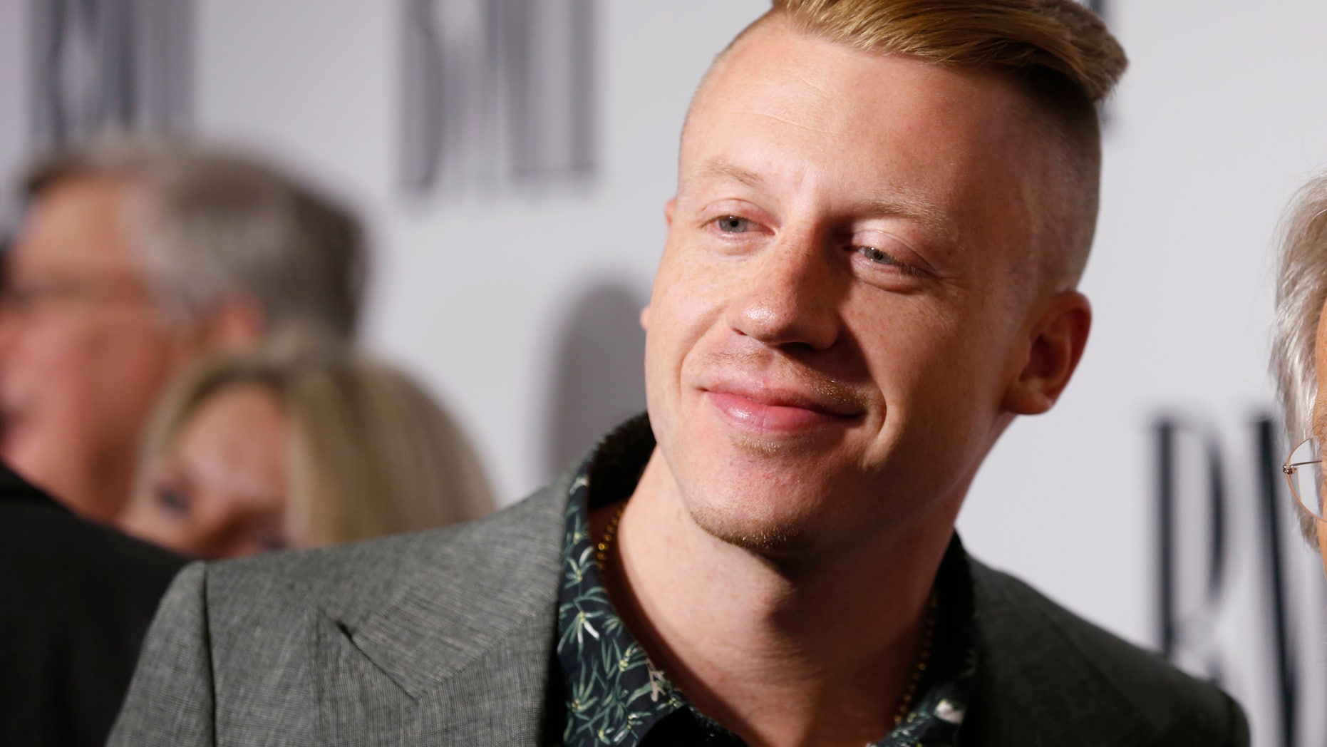 Musician Macklemore poses at the 62nd Annual BMI Pop Awards in Beverly Hills, California, May 13, 2014.