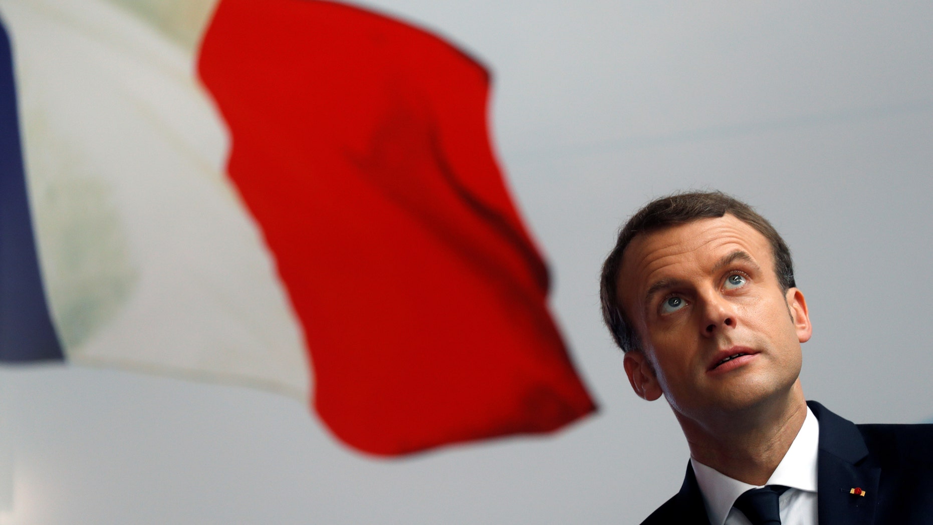 File photo - French President Emmanuel Macron attends a ceremony to start the construction of the first metro line in Abidjan, Ivory Coast, Nov. 30, 2017. (REUTERS/Philippe Wojazer) -