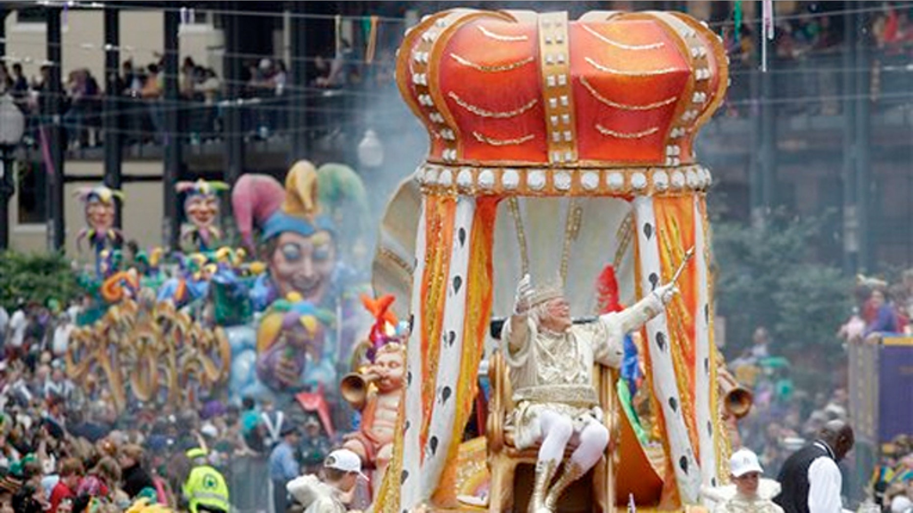FILE : Rex, the King of Carnival rides in the Krewe of Rex as he arrives at Canal St. on Mardi Gras day in New Orleans.
