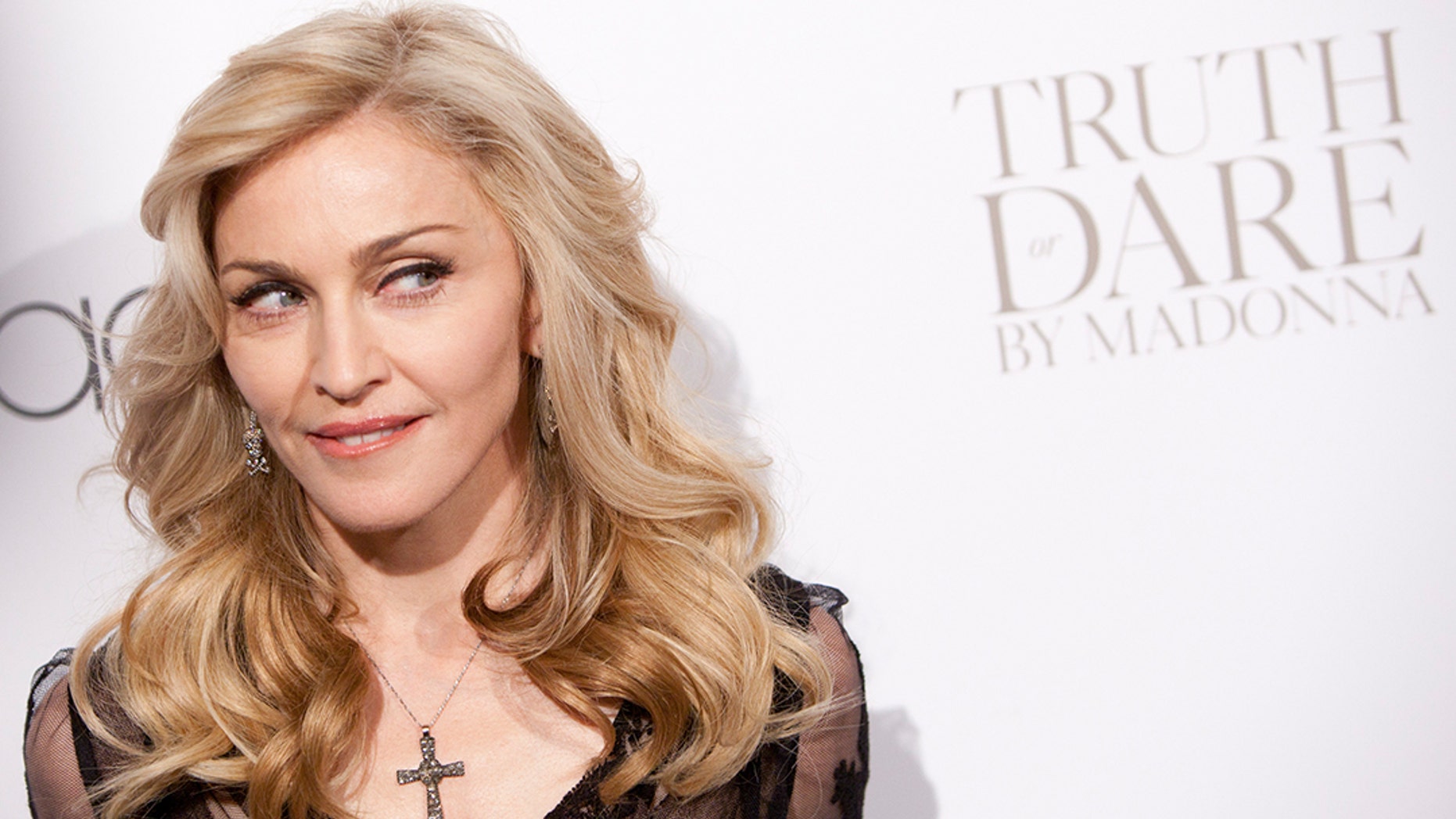 Madonna loses auction battle for her personal letter from late boyfriend, Tupac Shakur.