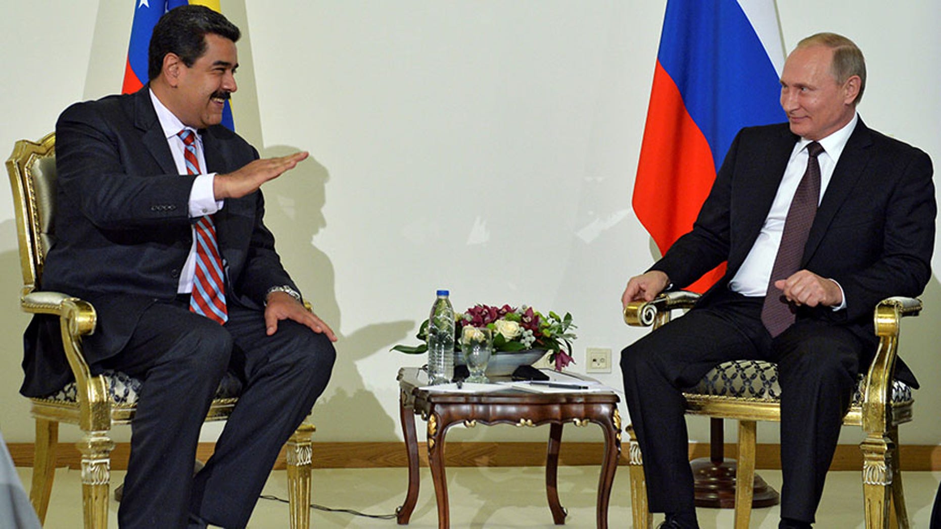 Venezuelan President Nicolas Maduro, left, and Russian President Vladimir Putin meet in Istanbul, Turkey, Oct. 10, 2016.
