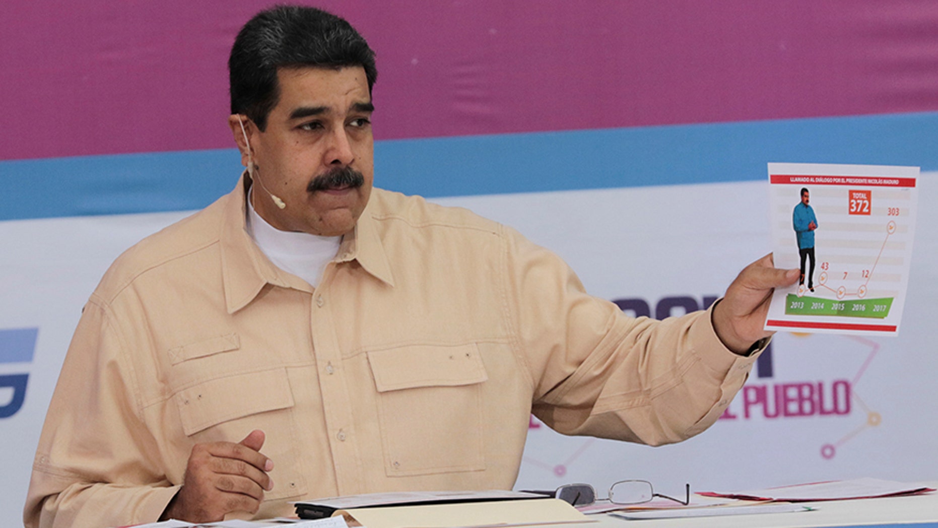 Venezuela President Nicolas Maduro speaks during his weekly radio and TV broadcast on Dec. 3, 2017.