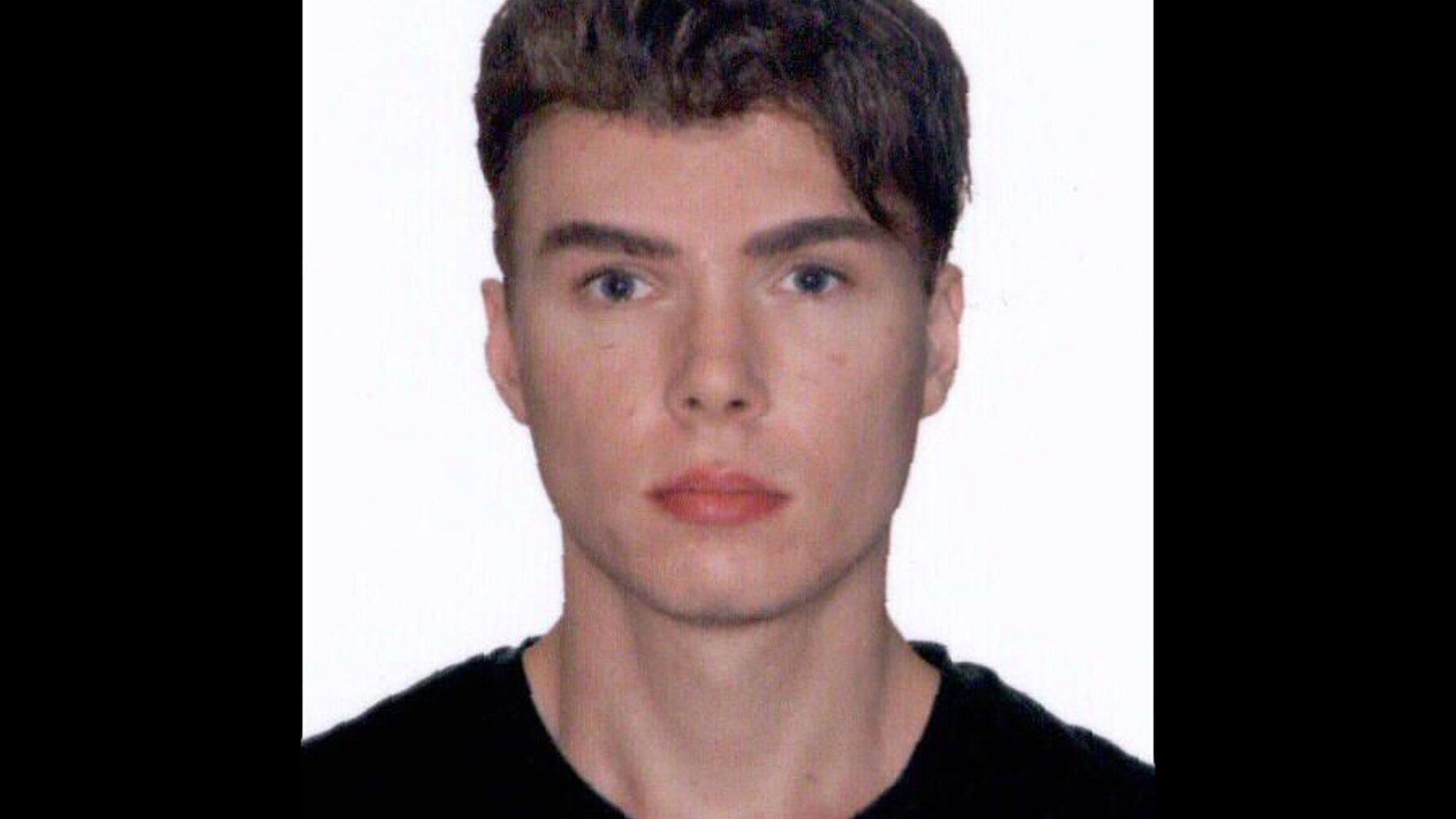 This image provided by Interpol shows an undated photo of Luka Rocco Magnotta, 29 years-old, who is accused of videotaping a gruesome murder before posting it to the internet will be charged with threatening Canada's prime minister after mailing a severed foot to his Conservative party headquarters, police said.