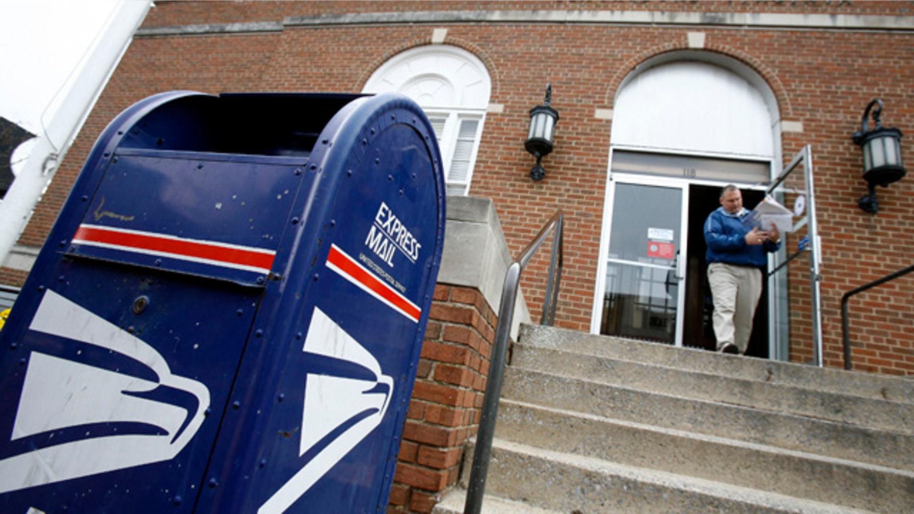 A man leaves the U.S. post office in Blacksburg, Virginia April 19, 2007.