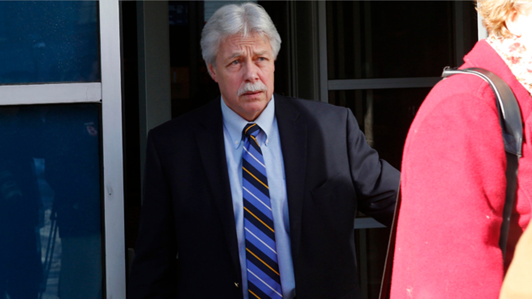 In this Jan. 18, 2013 file photo, Mark Strong Sr., leaves the Cumberland County Court House in Portland, Maine. The jury in Strongs trial watched a video Thursday, Feb. 28, 2013, showing a sexual encounter between Zumba fitness instructor Alexis Wright and a man who left cash on her massage table. Strong is charged with 13 counts that relate to promoting prostitution. He contends he had an affair with Wright and helped her launch her Pura Vida dance studio in Kennebunk, Maine, but his lawyer has said he was unaware of any paid sex.