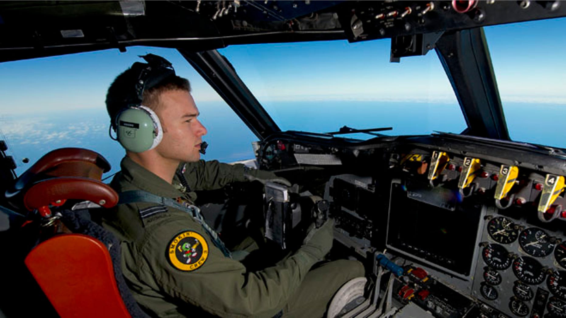 March 20, 2014 : Royal Australian Air Force pilot Flight Lieutenant Russell Adams steers his AP-3C Orion over the Southern Indian Ocean during the search for missing Malaysian Airlines flight MH370.